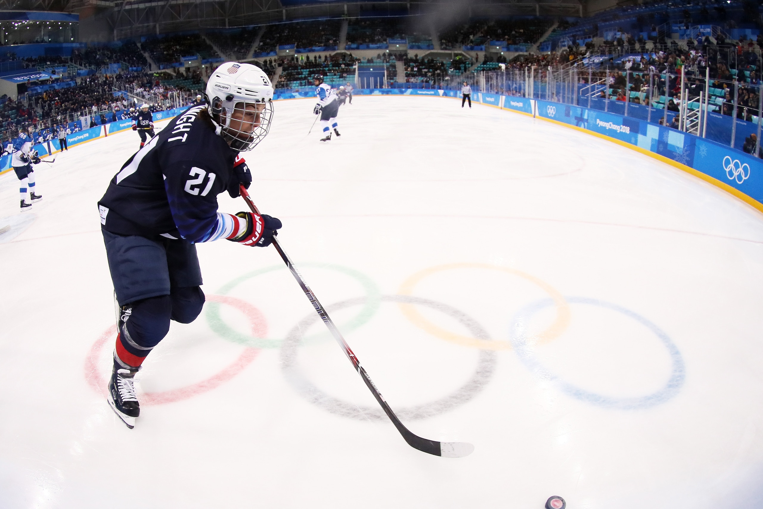 GANGNEUNG, SOUTH KOREA - FEBRUARY 19: Hilary Knight #21 of the United States play sthe puck against Finland  during the Ice Hockey Women Play-offs Semifinals on day 10 of the PyeongChang 2018 Winter Olympic Games at Gangneung Hockey Centre on February 19,