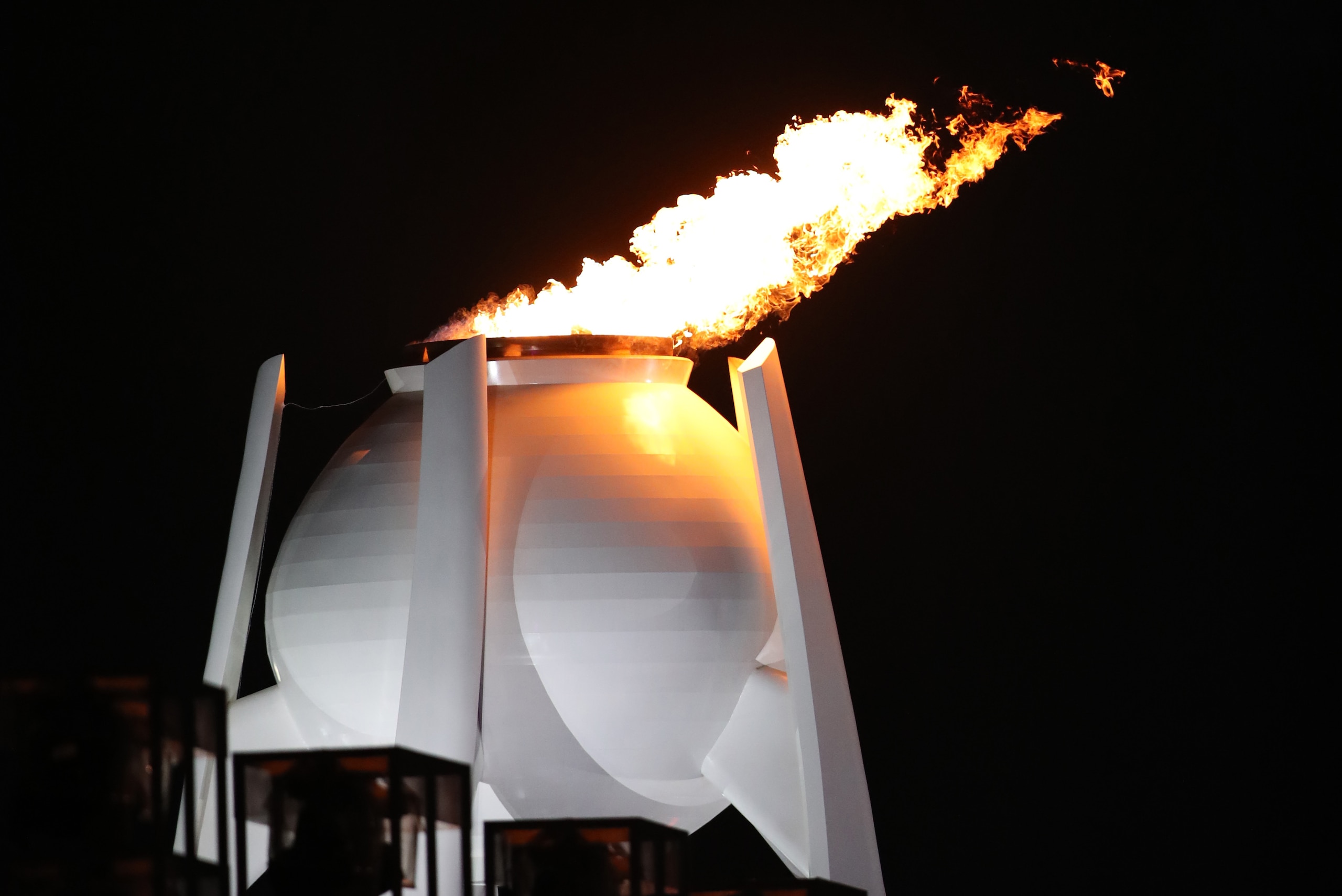 PYEONGCHANG-GUN, SOUTH KOREA - FEBRUARY 09: Yuna Kim lights the Olympic flame during the Opening Ceremony of the PyeongChang 2018 Winter Olympic Games at PyeongChang Olympic Stadium on February 9, 2018 in Pyeongchang-gun, South Korea. (Photo by Ian MacNic