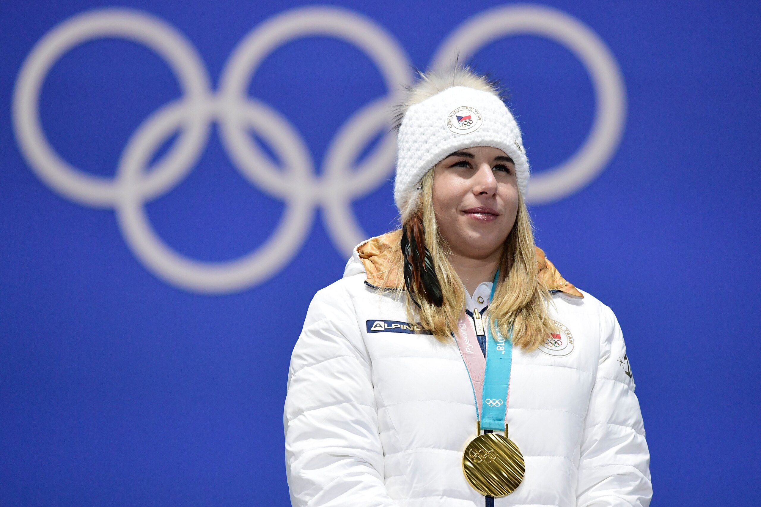 Czech Republic's gold medallist Ester Ledecka poses on the podium during the medal ceremony for the alpine skiing women's Super-G at the Pyeongchang Medals Plaza during the Pyeongchang 2018 Winter Olympic Games in Pyeongchang on February 17, 2018. / AFP P