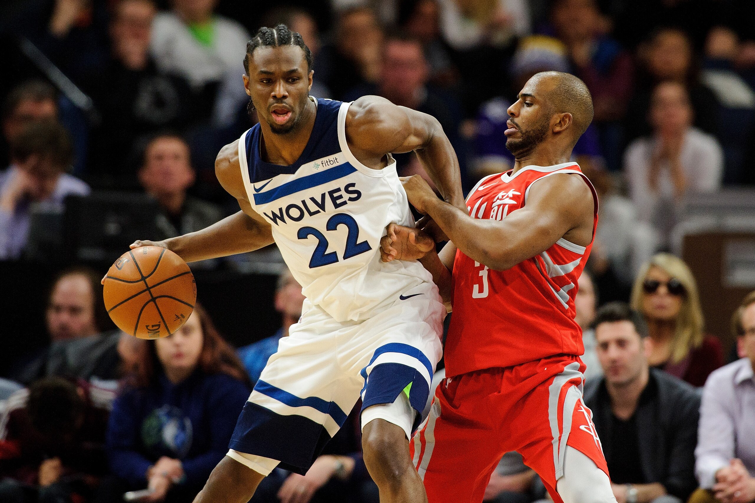 MINNEAPOLIS, MN - FEBRUARY 13: Chris Paul #3 of the Houston Rockets defends against Andrew Wiggins #22 of the Minnesota Timberwolves during the game on February 13, 2018 at the Target Center in Minneapolis, Minnesota. NOTE TO USER: User expressly acknowle