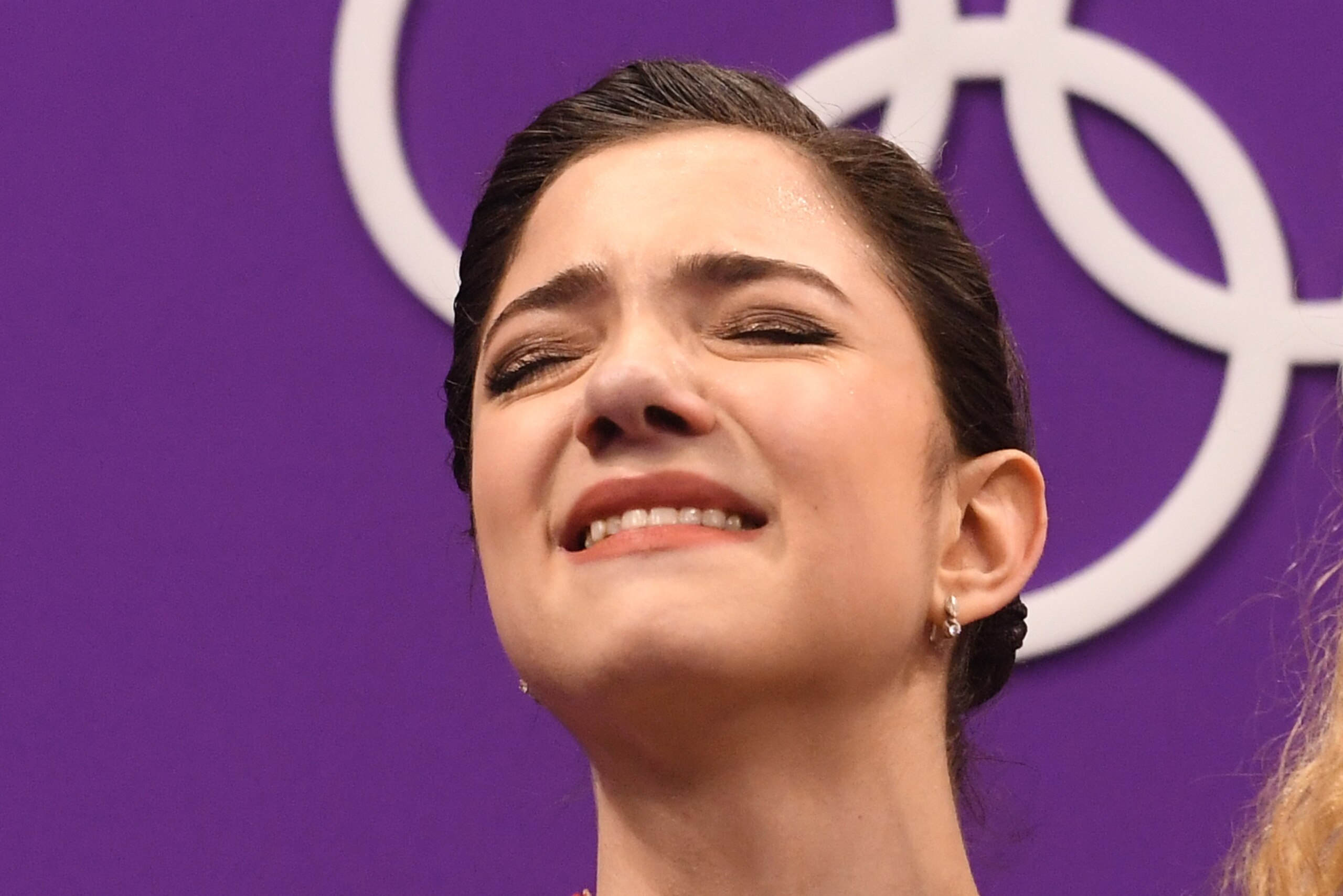 Russia's Evgenia Medvedeva reacts after the women's single skating free skating of the figure skating event during the Pyeongchang 2018 Winter Olympic Games at the Gangneung Ice Arena in Gangneung on February 23, 2018. / AFP PHOTO / Roberto SCHMIDT Russia's Evgenia Medvedeva reacts after the women's single skating free skating of the figure skating event during the Pyeongchang 2018 Winter Olympic Games at the Gangneung Ice Arena in Gangneung on February 23, 2018. / AFP PHOTO / Roberto SCHMIDT