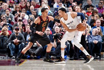 CLEVELAND, OH - FEBRUARY 22: Jordan Clarkson #8 of the Cleveland Cavaliers defends against Otto Porter Jr. #22 of the Washington Wizards during the game between the two teams on February 22, 2018 at Quicken Loans Arena in Cleveland, Ohio. NOTE TO USER: Us