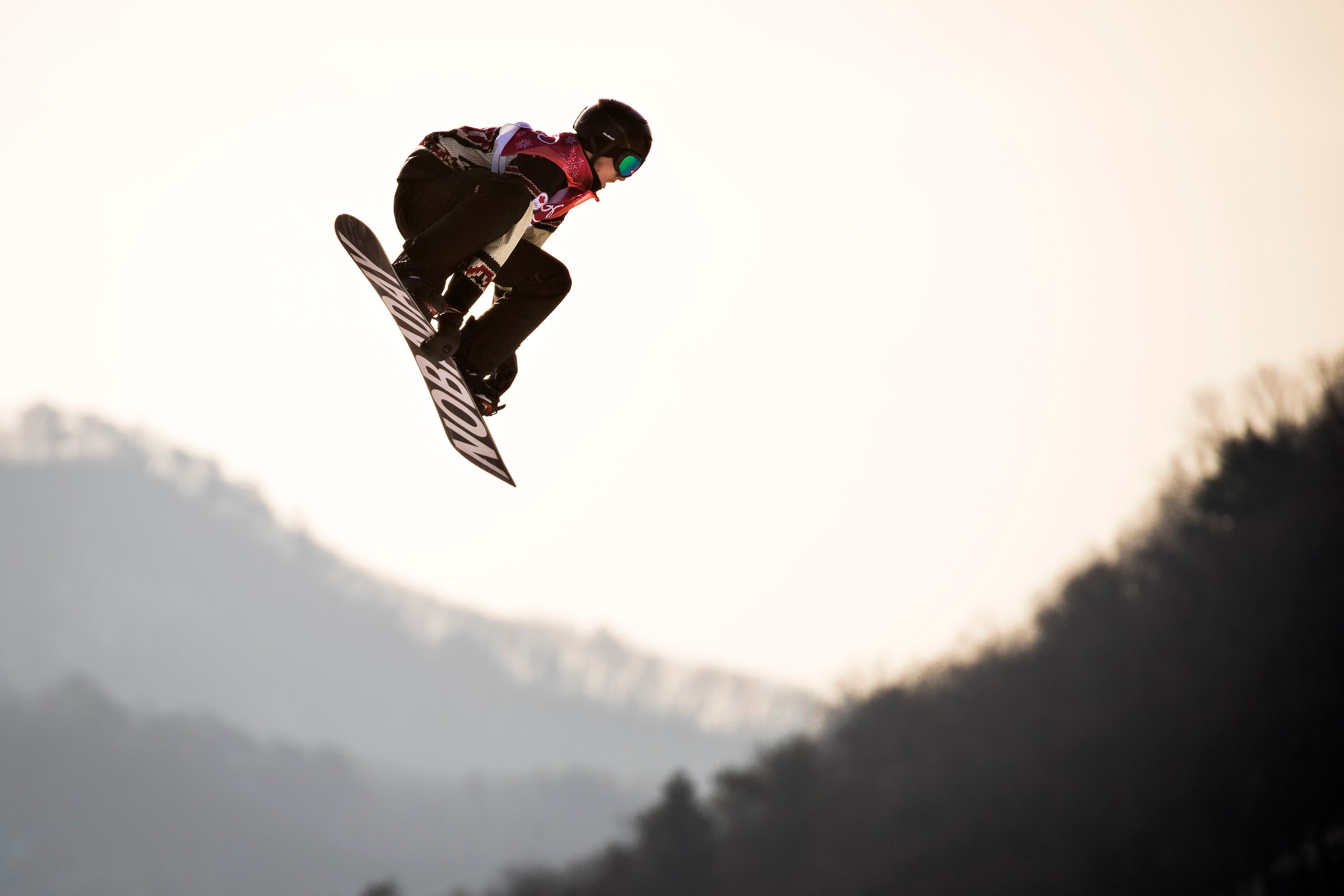 Canada's Max Parrot competes during the qualification of the men's snowboard big air event at the Alpensia Ski Jumping Centre during the Pyeongchang 2018 Winter Olympic Games in Pyeongchang on February 21, 2018.  / AFP PHOTO / Odd ANDERSEN        (Photo c