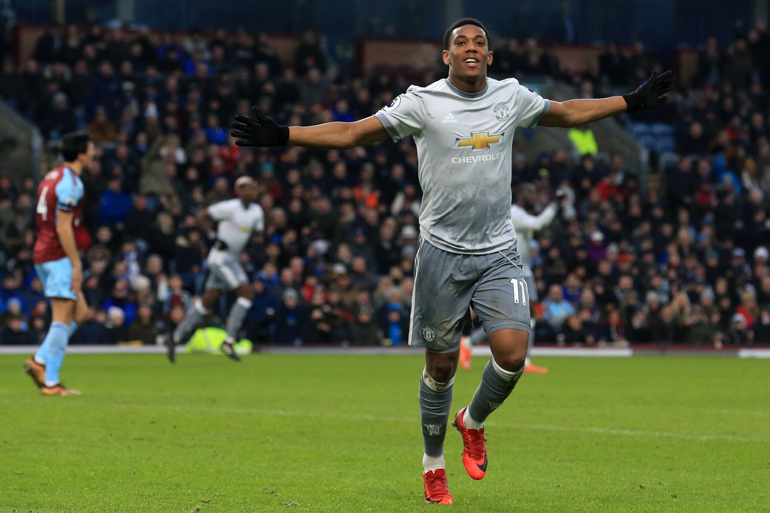 Manchester United's French striker Anthony Martial celebrates after scoring the opening goal of the English Premier League football match between Burnley and Manchester United at Turf Moor in Burnley, north west England on January 20, 2018. / AFP PHOTO / 
