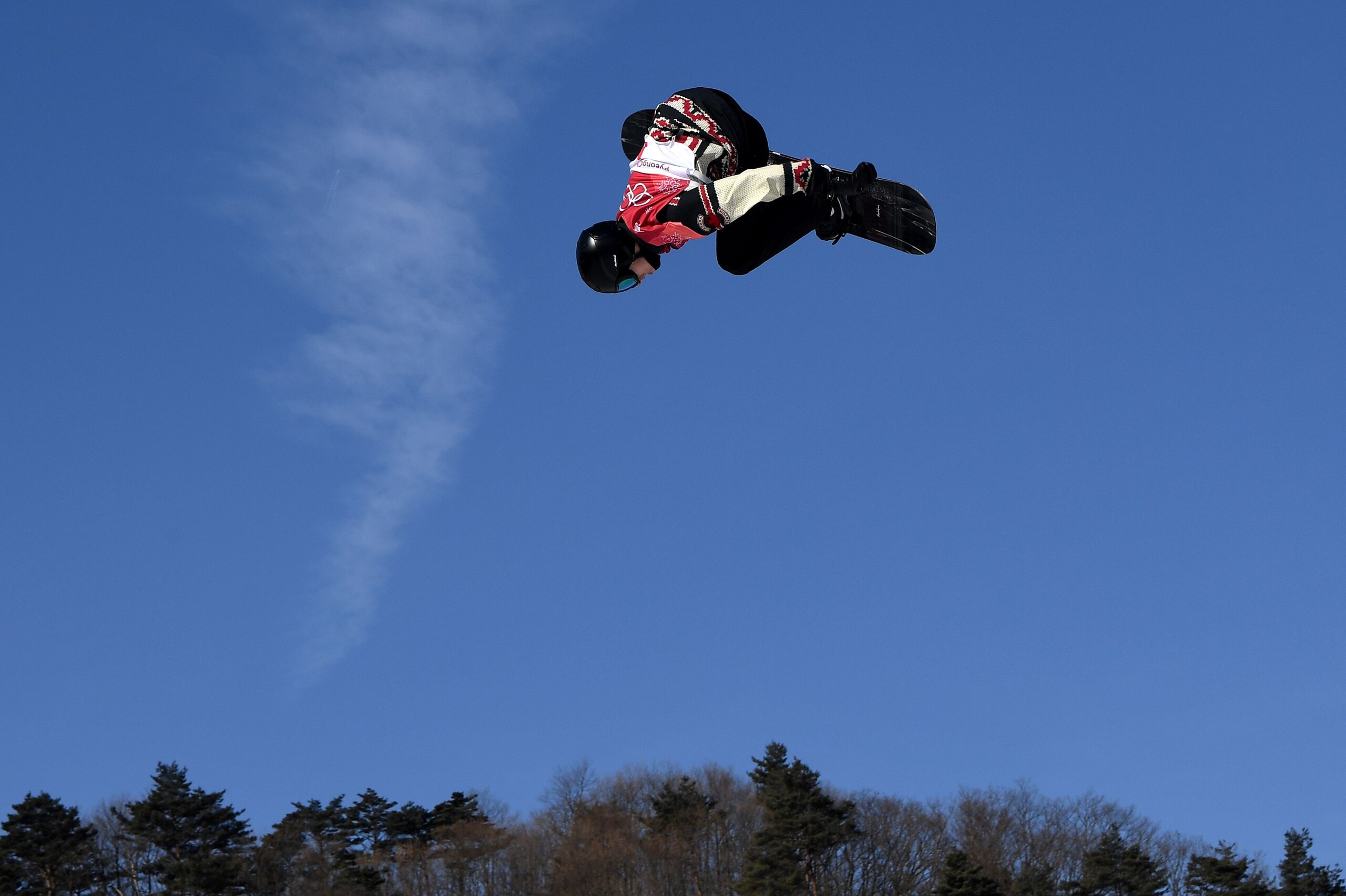 Canadian Max Parrot competes during the qualification of the men's snowboard big air event at the Alpensia Ski Jumping Centre during the Pyeongchang 2018 Winter Olympic Games in Pyeongchang on February 21, 2018.  / AFP PHOTO / FRANCK FIFE        (Photo cr