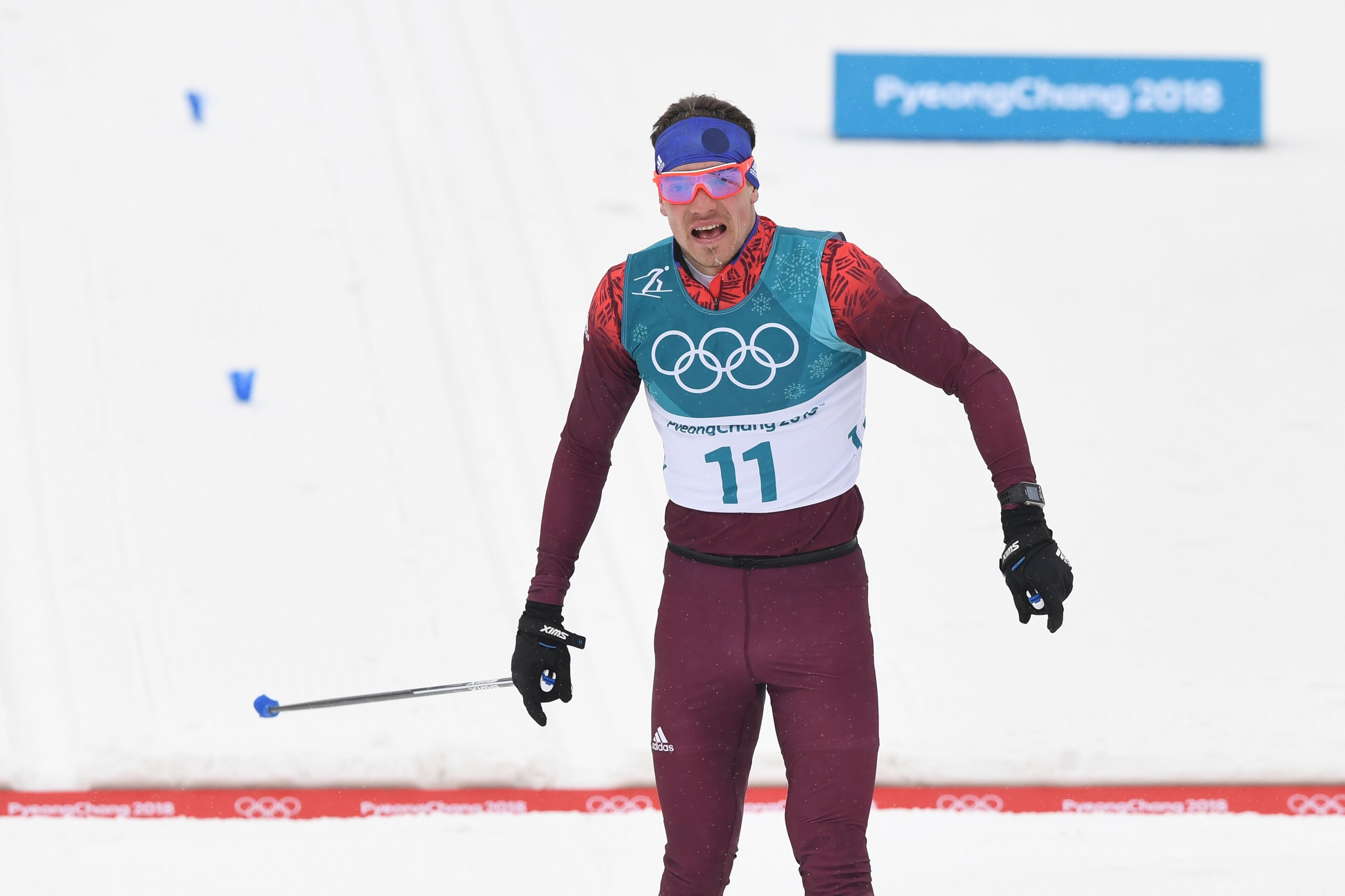 Russia's Alexander Bolshunov crosses the finish line to win silver in the men's 50km cross country mass start classic at the Alpensia cross country ski centre during the Pyeongchang 2018 Winter Olympic Games on February 24, 2018 in Pyeongchang. / AFP PHO Russia's Alexander Bolshunov crosses the finish line to win silver in the men's 50km cross country mass start classic at the Alpensia cross country ski centre during the Pyeongchang 2018 Winter Olympic Games on February 24, 2018 in Pyeongchang. / AFP PHO