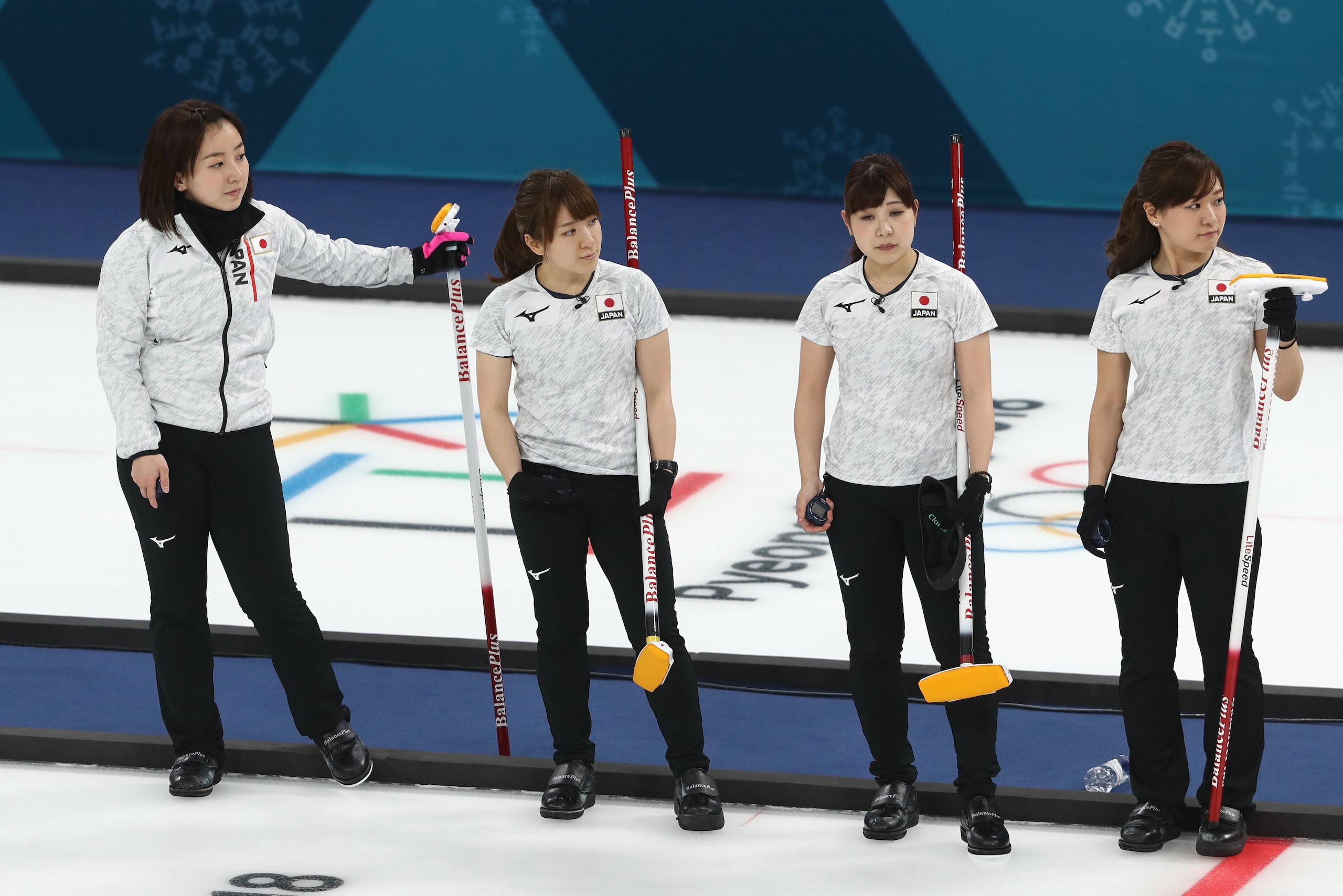 GANGNEUNG, SOUTH KOREA - FEBRUARY 20: Satsuki Fujisawa, Chinami Yoshida, Yumi Suzuki and Yurika Yoshida of Japan look on during the Women's Round Robin Session 10 on day eleven of the PyeongChang 2018 Winter Olympic Games at Gangneung Curling Centre on Fe GANGNEUNG, SOUTH KOREA - FEBRUARY 20: Satsuki Fujisawa, Chinami Yoshida, Yumi Suzuki and Yurika Yoshida of Japan look on during the Women's Round Robin Session 10 on day eleven of the PyeongChang 2018 Winter Olympic Games at Gangneung Curling Centre on Fe