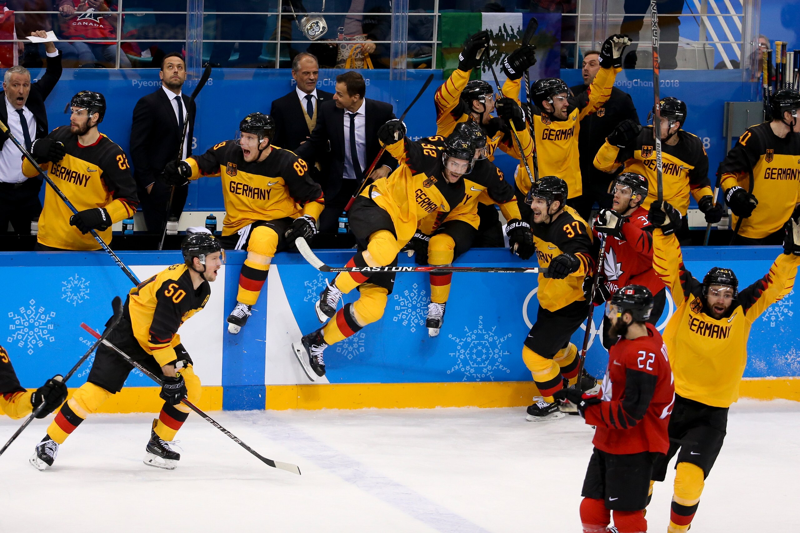GANGNEUNG, SOUTH KOREA - FEBRUARY 23, 2018: Players of Germany celebrate after victory in Men's Semifinal ice hockey match between Canada and Germany on day fourteen of the 2018 Winter Olympic Games at Gangneung Hockey Centre on February 23, 2018 in Gangn GANGNEUNG, SOUTH KOREA - FEBRUARY 23, 2018: Players of Germany celebrate after victory in Men's Semifinal ice hockey match between Canada and Germany on day fourteen of the 2018 Winter Olympic Games at Gangneung Hockey Centre on February 23, 2018 in Gangn