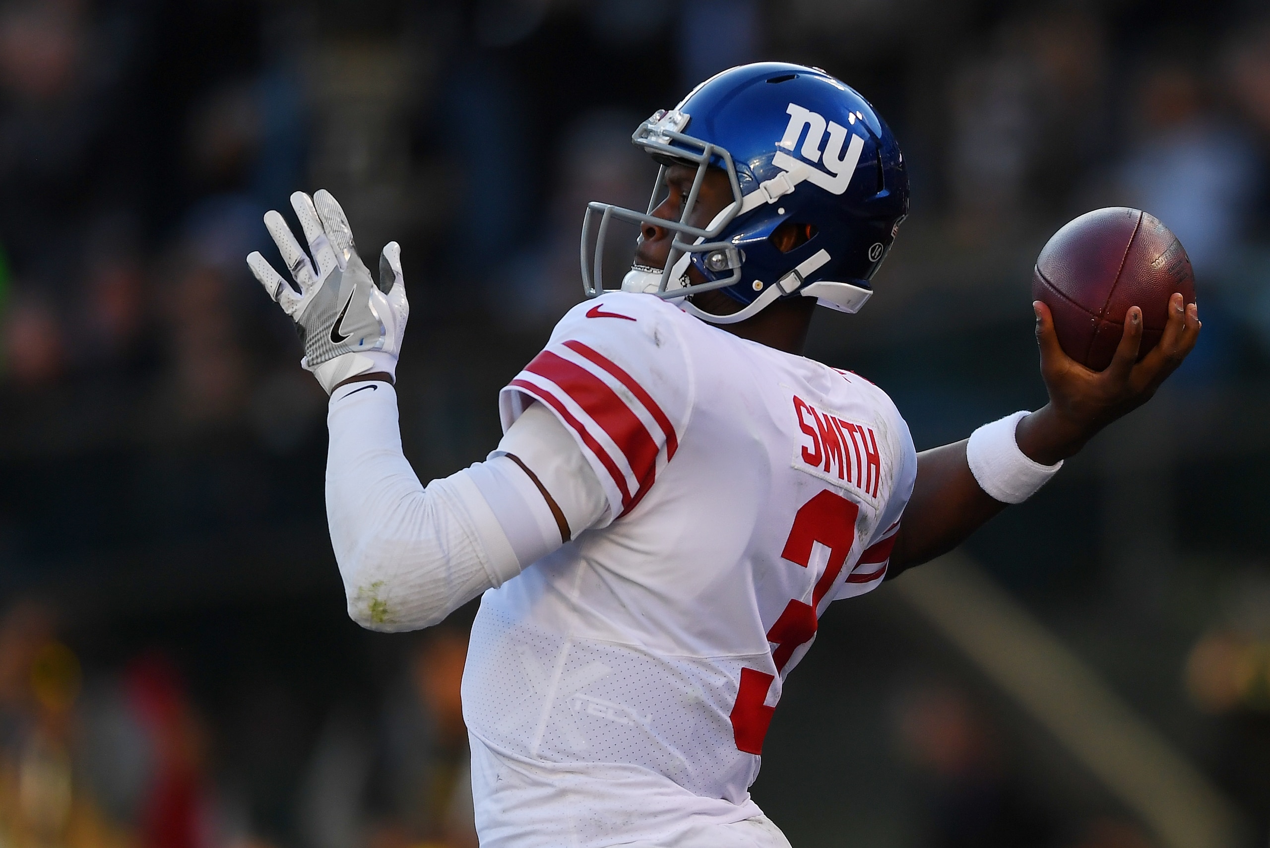 OAKLAND, CA - DECEMBER 03:  Geno Smith #3 of the New York Giants drops back to pass against the Oakland Raiders during their NFL football game at Oakland-Alameda County Coliseum on December 3, 2017 in Oakland, California.  (Photo by Thearon W. Henderson/G