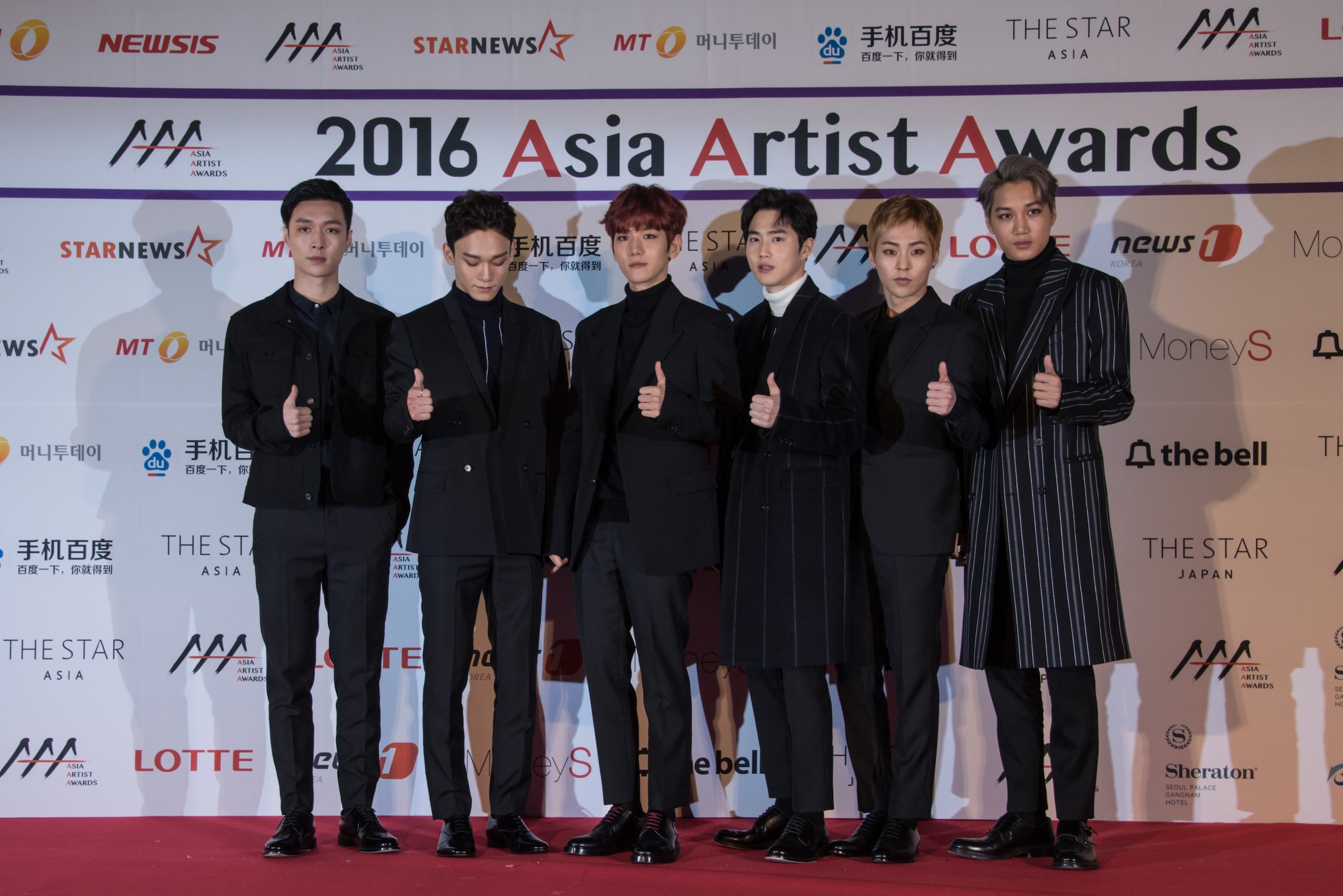South Korean K-pop group 'Exo' pose on the red carpet of the '2016 Asia Artist Awards' in Seoul on November 16, 2016.
The Asia Artist Awards (AAA) aims to recognise excellent performance across Korean music and television dramas from around Asia.  / AFP /