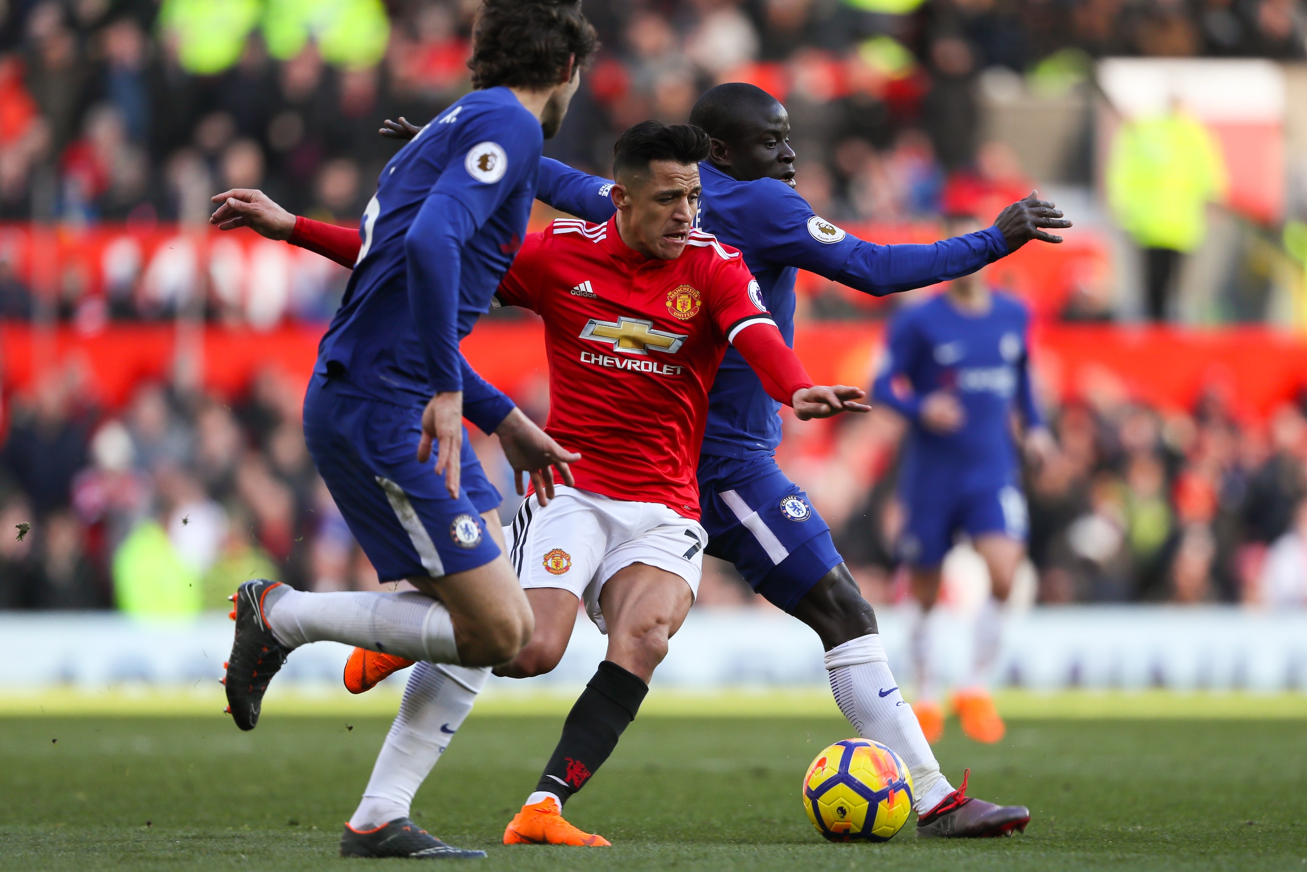 MANCHESTER, ENGLAND - FEBRUARY 25: Alexis Sanchez of Manchester United and Ngolo Kante of Chelsea during the Premier League match between Manchester United and Chelsea at Old Trafford on February 25, 2018 in Manchester, England. (Photo by Matthew Ashton -