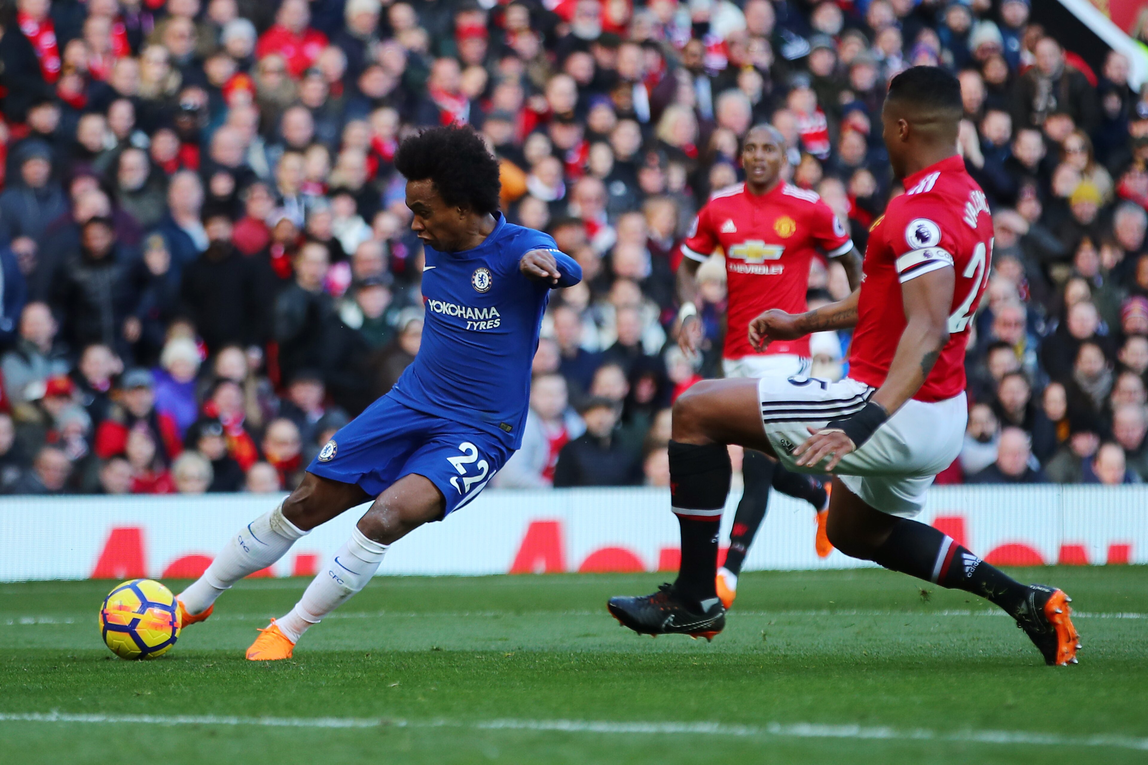 MANCHESTER, ENGLAND - FEBRUARY 25: Willian of Chelsea scores his sides first goal during the Premier League match between Manchester United and Chelsea at Old Trafford on February 25, 2018 in Manchester, England. (Photo by Clive Brunskill/Getty Images) MANCHESTER, ENGLAND - FEBRUARY 25: Willian of Chelsea scores his sides first goal during the Premier League match between Manchester United and Chelsea at Old Trafford on February 25, 2018 in Manchester, England. (Photo by Clive Brunskill/Getty Images)