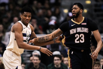 MILWAUKEE, WI - FEBRUARY 25:  Giannis Antetokounmpo #34 of the Milwaukee Bucks guards against Anthony Davis #23 of the New Orleans Pelicans in the first quarter at the Bradley Center on February 25, 2018 in Milwaukee, Wisconsin. NOTE TO USER: User express