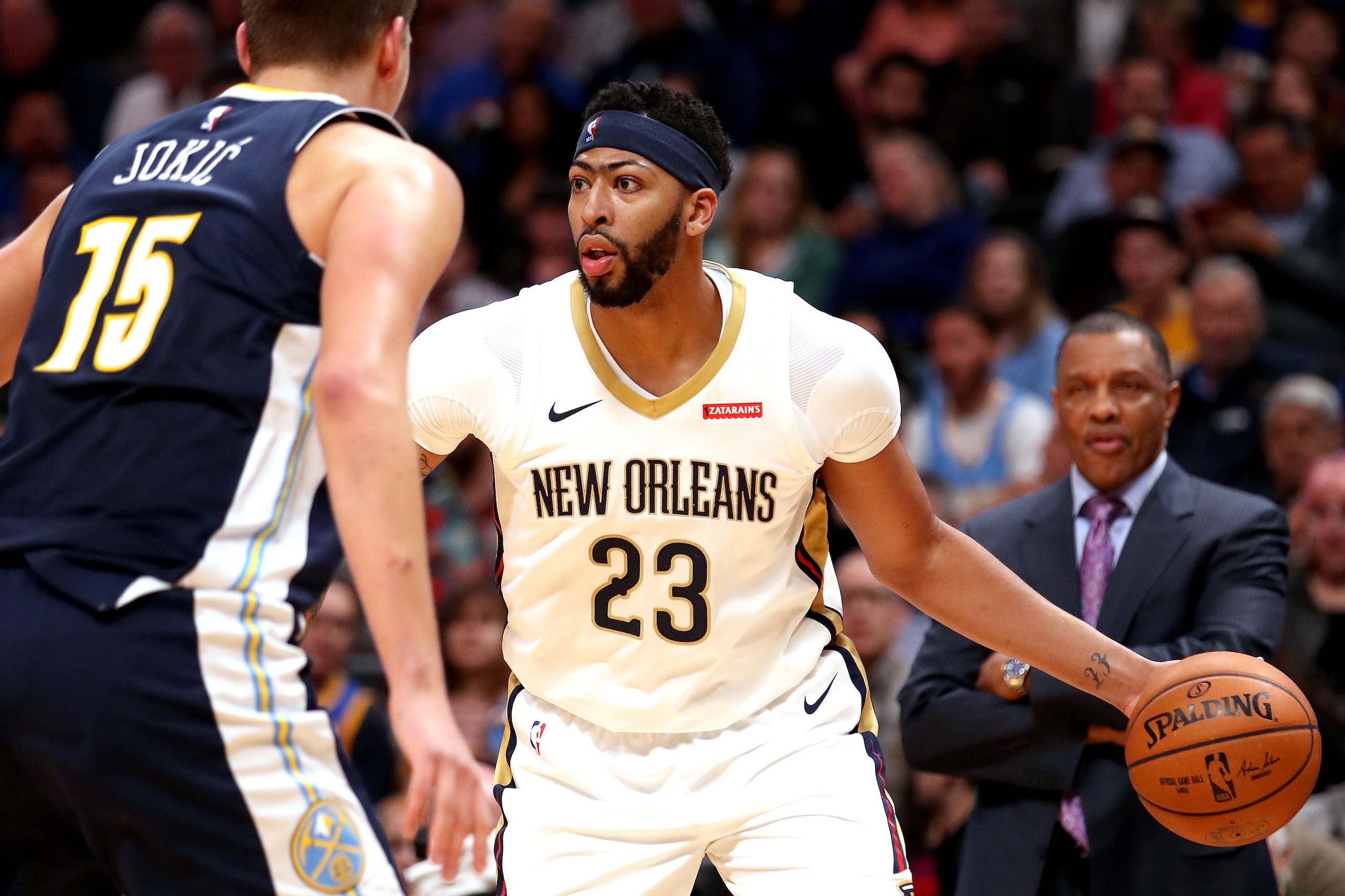 DENVER, CO - NOVEMBER 17:  Anthony Davis #23 of the New Orleans Pelicans looks for an outlet while being guarded by Nikola Jokic #15 of the Denver Nuggets at the Pepsi Center on November 17, 2017 in Denver, Colorado. NOTE TO USER: User expressly acknowled