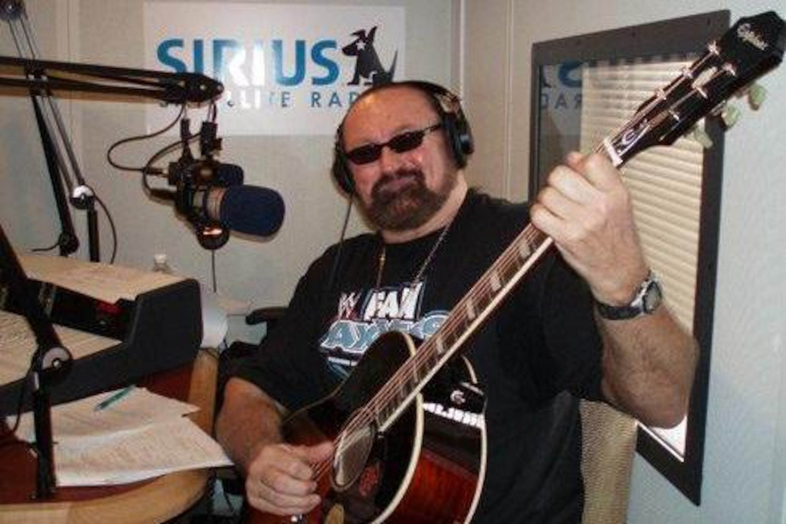 Hillbilly Jim has traded the ring for the radio studio.