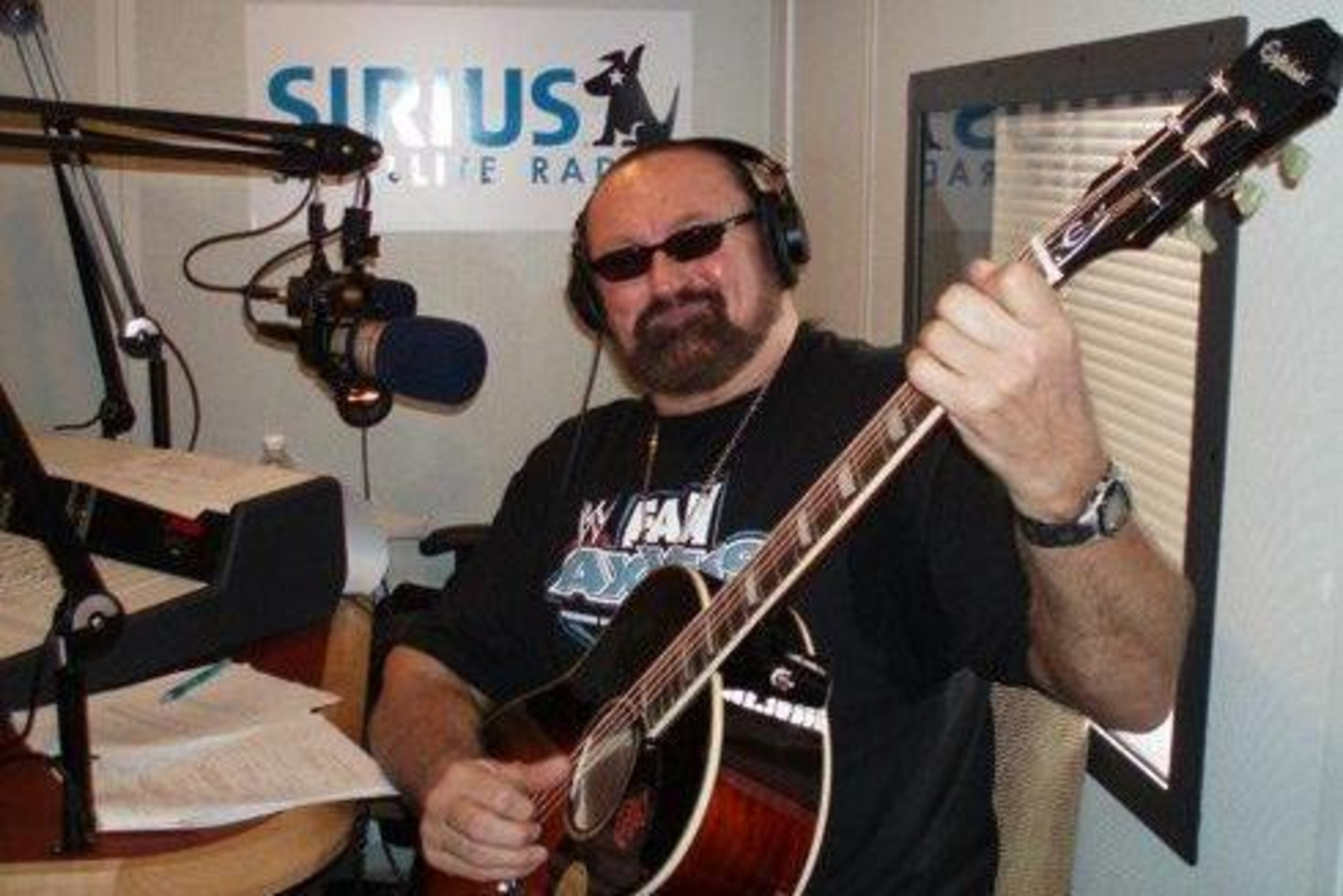 Hillbilly Jim has traded the ring for the radio studio.