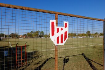 Instituto's club badge at their training ground, La Agustina
