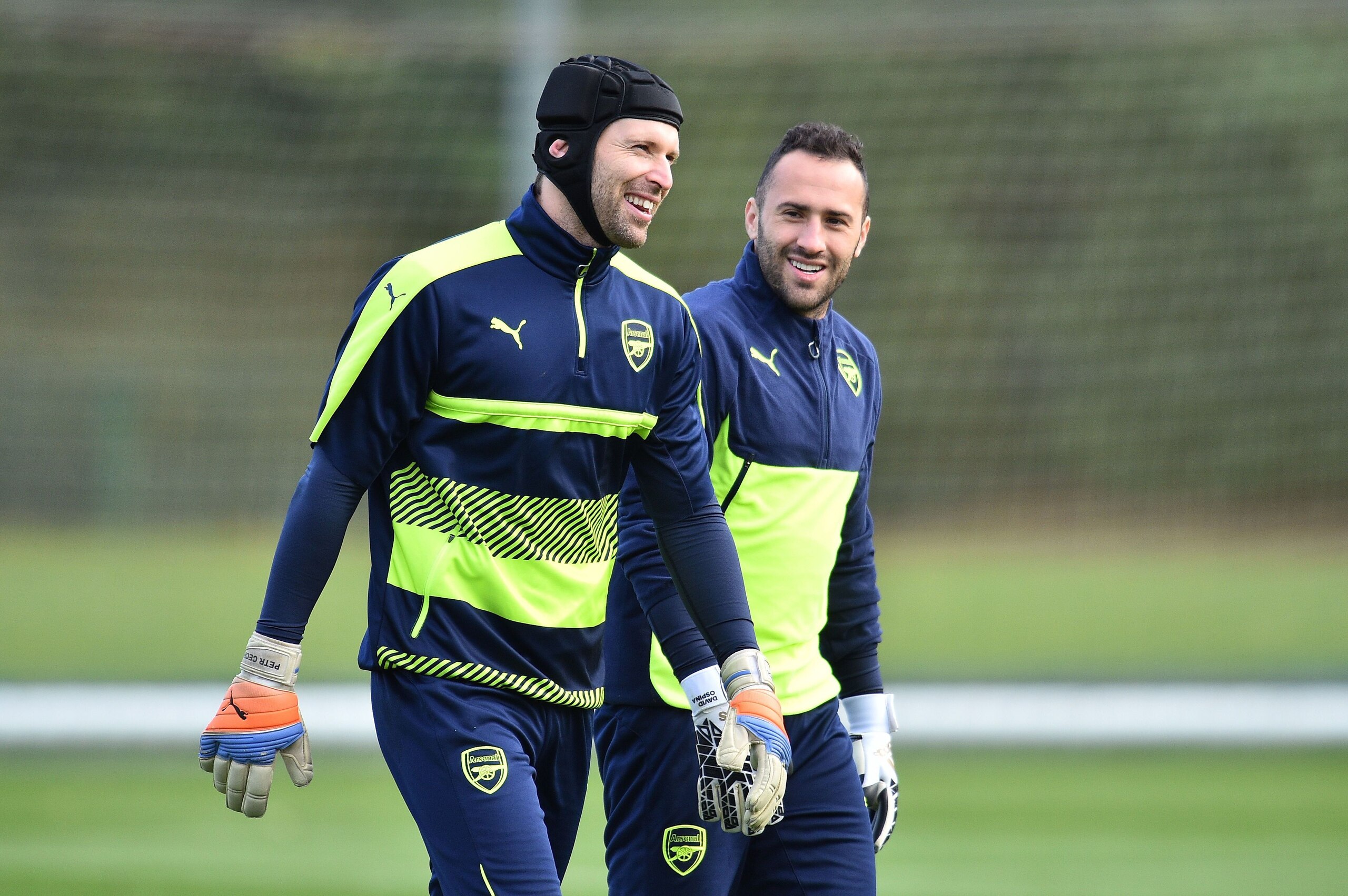 Arsenal's Czech goalkeeper Petr Cech (L) speaks with Colombian goalkeeper David Ospina during a training session ahead of the UEFA Champions League group stage football match against Paris Saint Germain at Arsenal's training ground, London Colney on Novem Arsenal's Czech goalkeeper Petr Cech (L) speaks with Colombian goalkeeper David Ospina during a training session ahead of the UEFA Champions League group stage football match against Paris Saint Germain at Arsenal's training ground, London Colney on Novem