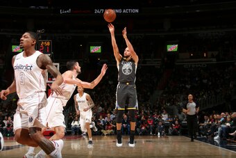 WASHINGTON, DC - FEBRUARY 28: Stephen Curry #30 of the Golden State Warriors shoots the ball against the Washington Wizards on February 28, 2018 at Capital One Arena in Washington, DC. NOTE TO USER: User expressly acknowledges and agrees that, by download