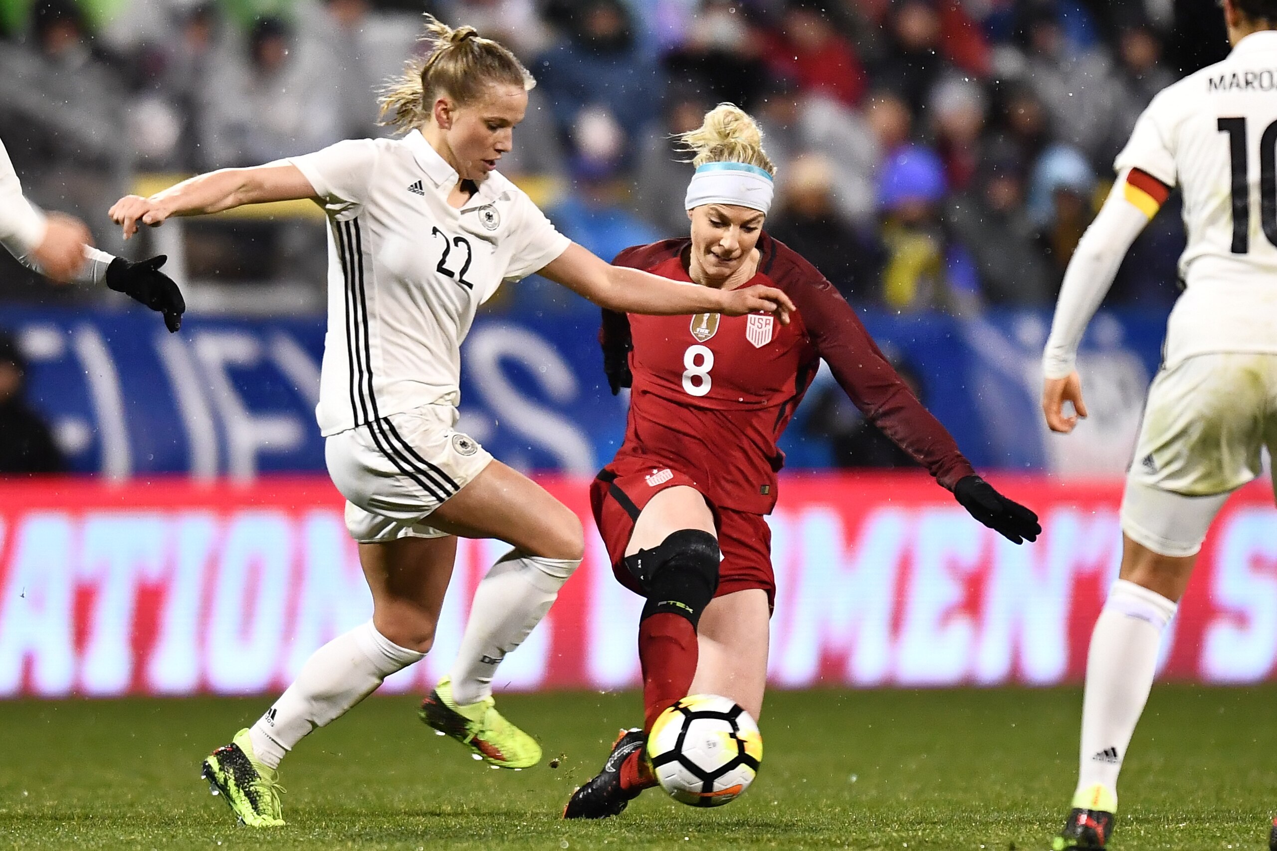 COLUMBUS, OH - MARCH 1:  Tabea Kemme #23 of Germany and Julie Ertz #8 of the US National Team battle for control of the ball in the second half on March 1, 2018 at MAPFRE Stadium in Columbus, Ohio. The United States defeated Germany 1-0.  (Photo by Jamie 