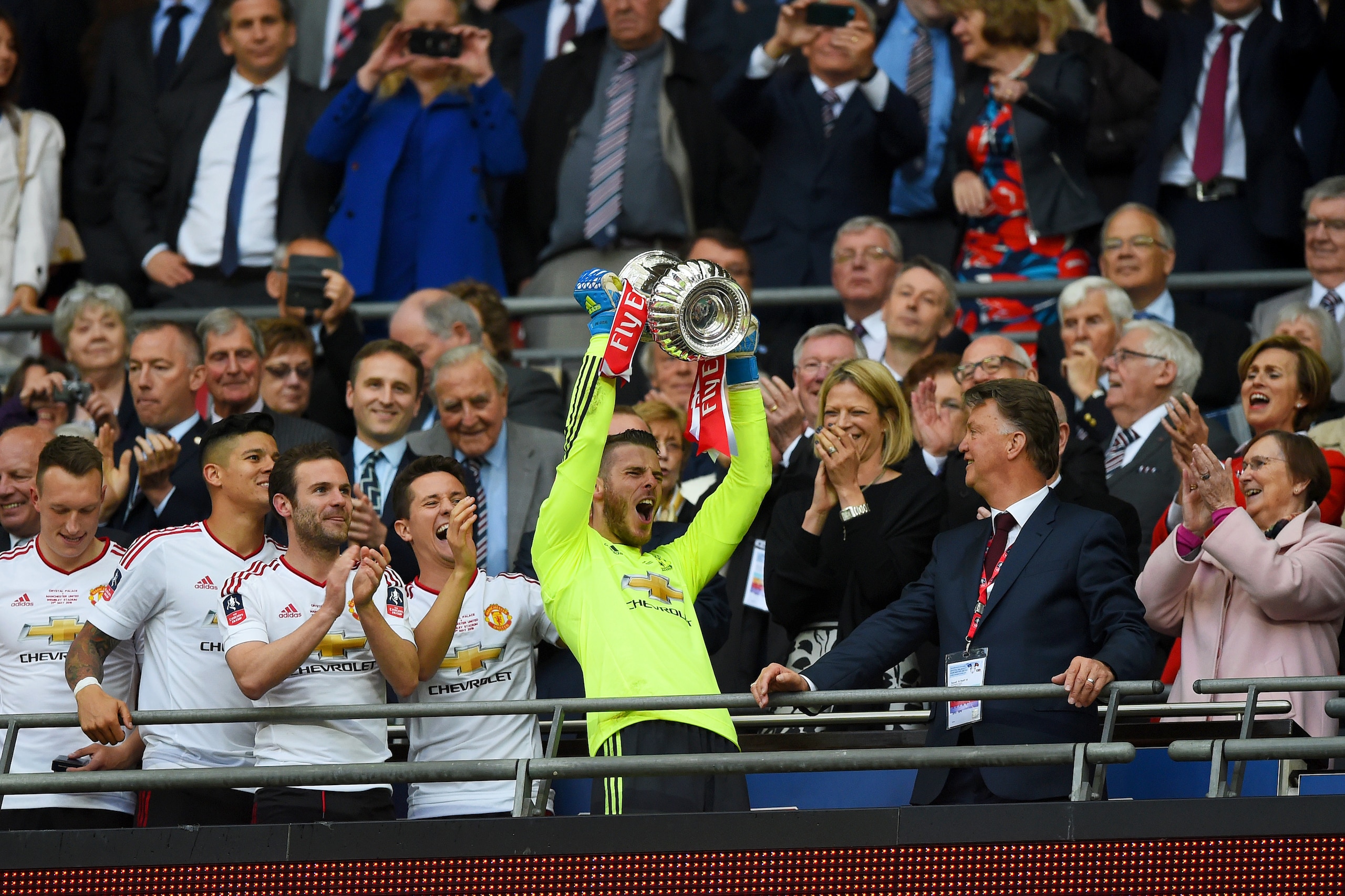 LONDON, ENGLAND - MAY 21:  David De Gea of Manchester United lifts the trophy after winning The Emirates FA Cup Final match between Manchester United and Crystal Palace at Wembley Stadium on May 21, 2016 in London, England.  (Photo by Shaun Botterill/Gett