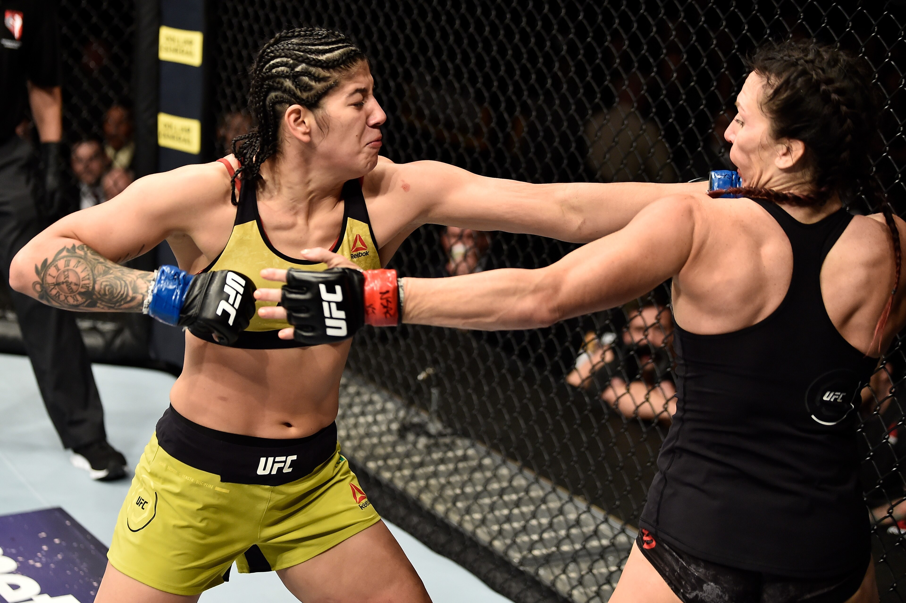 LAS VEGAS, NV - MARCH 03:   (L-R) Ketlen Vieira of Brazil punches Cat Zingano in their women's bantamweight bout during the UFC 222 event inside T-Mobile Arena on March 3, 2018 in Las Vegas, Nevada. (Photo by Jeff Bottari/Zuffa LLC/Zuffa LLC via Getty Ima