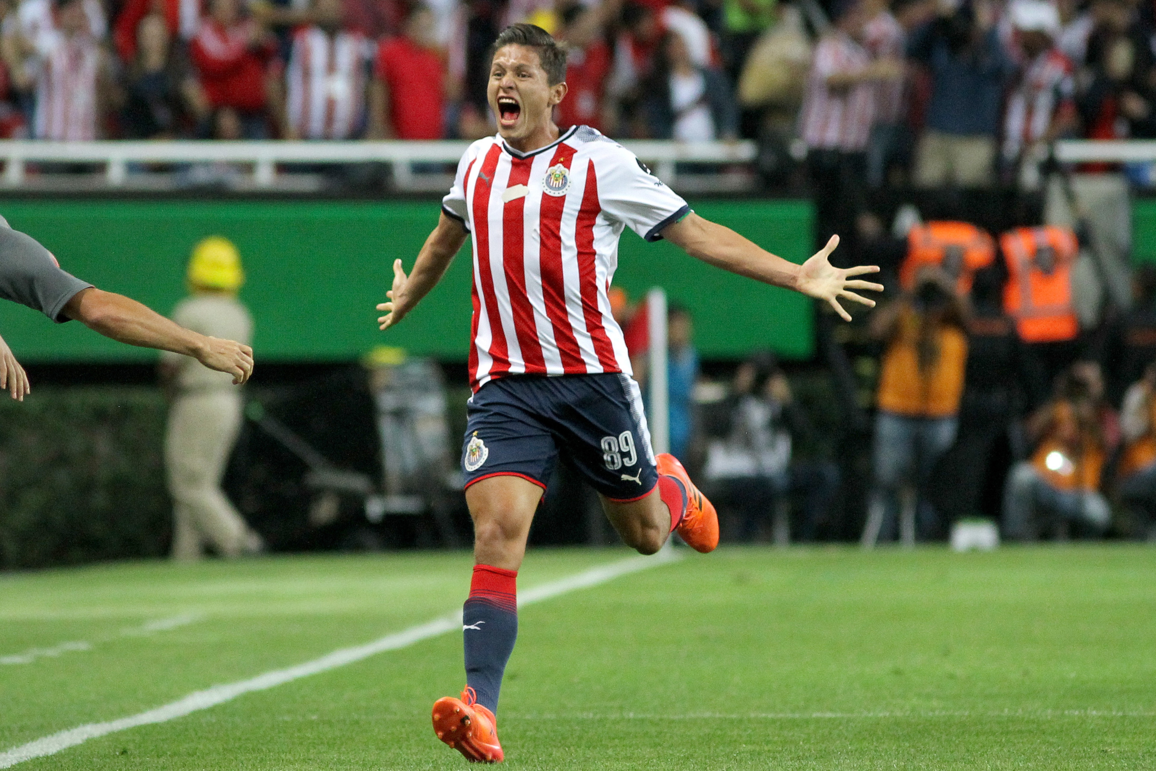 Jesus Godinez of Guadalajara celebrates his goal against America, during their Mexican Clausura 2018 tournament football match at Akron stadium in Guadalajara, Jalisco State, Mexico, on March 03, 2018. / AFP PHOTO / ULISES RUIZ        (Photo credit should