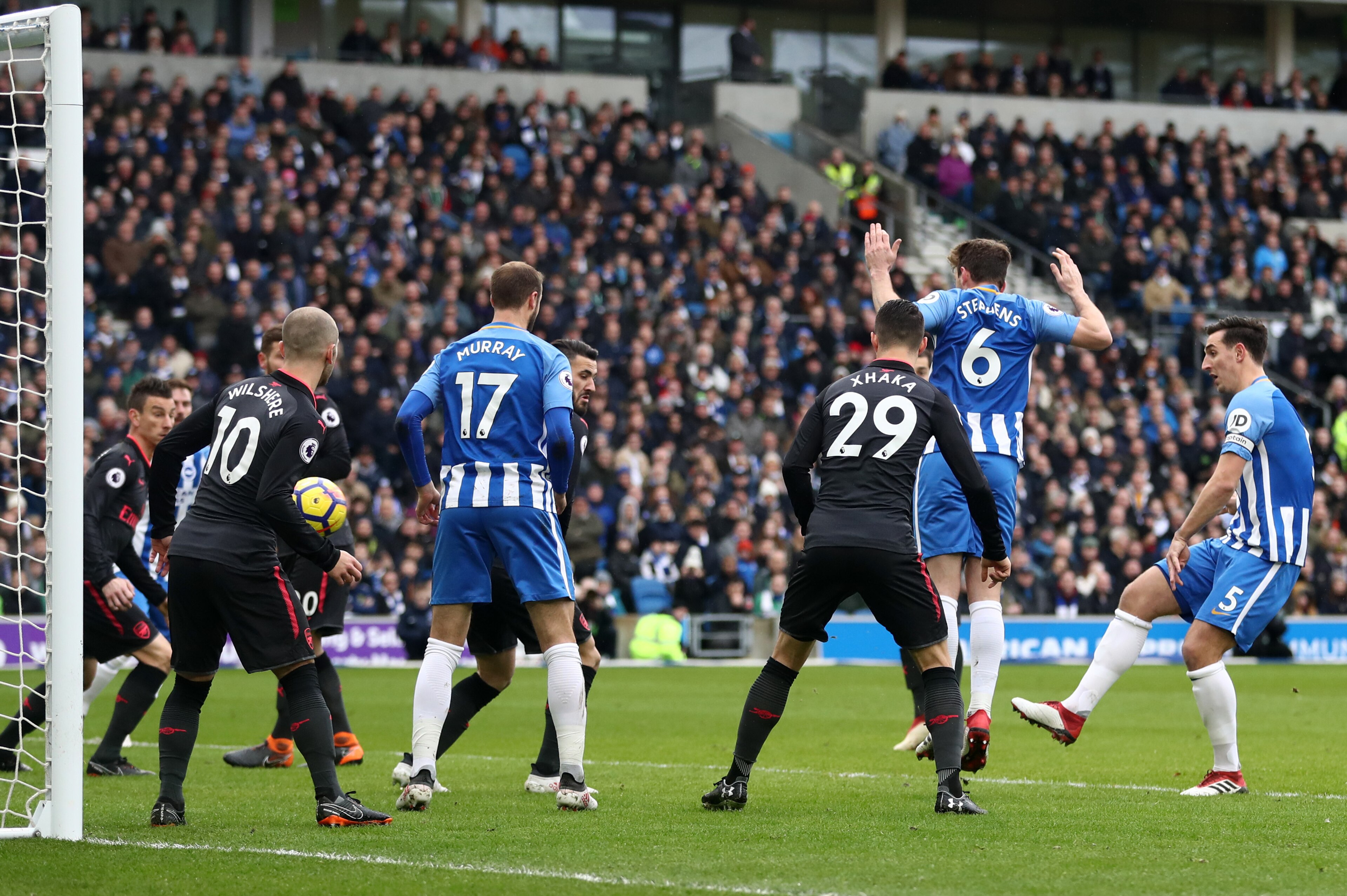 BRIGHTON, ENGLAND - MARCH 04:  Lewis Dunk of Brighton and Hove Albion scores his sides first goal during the Premier League match between Brighton and Hove Albion and Arsenal at Amex Stadium on March 4, 2018 in Brighton, England.  (Photo by Catherine Ivil