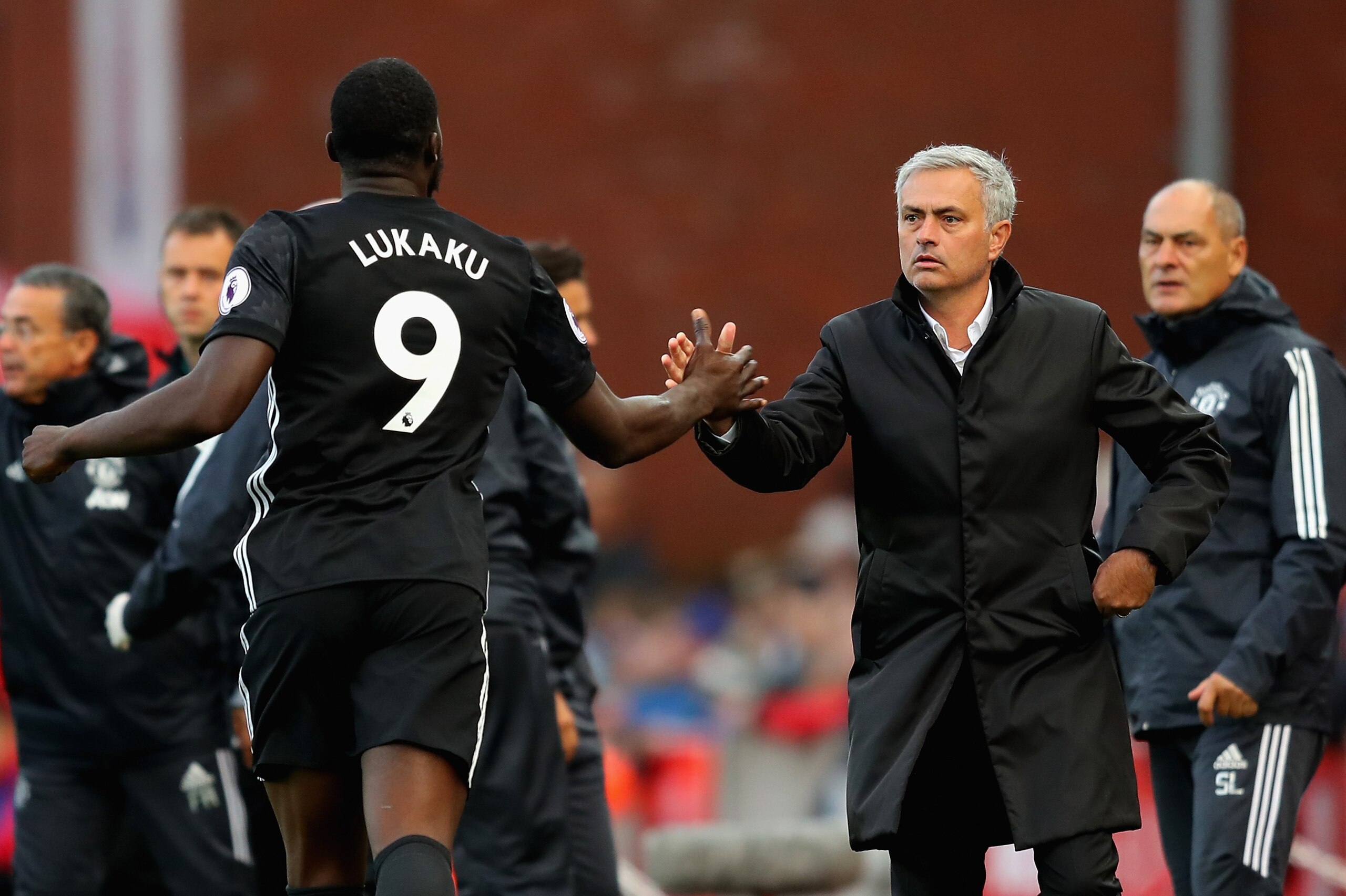 STOKE ON TRENT, ENGLAND - SEPTEMBER 09:  Romelu Lukaku of Manchester United celebrates scoring his sides second goal with Jose Mourinho, Manager of Manchester United during the Premier League match between Stoke City and Manchester United at Bet365 Stadiu