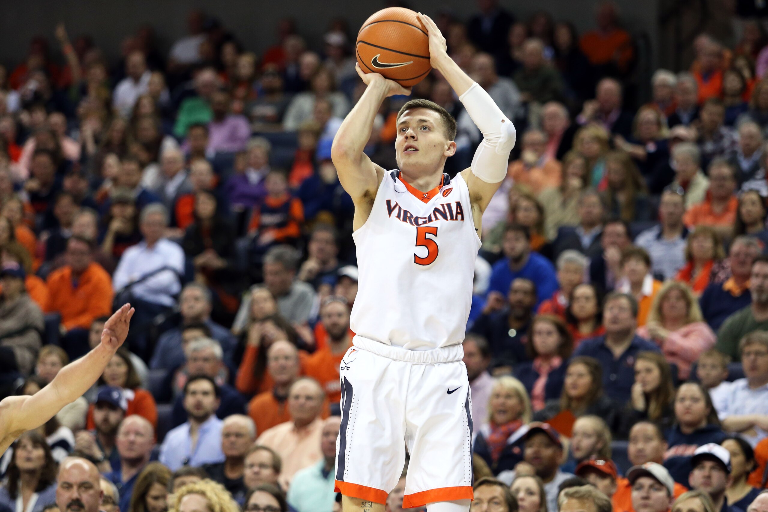 CHARLOTTESVILLE, VA - MARCH 3: Kyle Guy #5 of the Virginia Cavaliers shoots in the first half during a game against the Notre Dame Fighting Irish at John Paul Jones Arena on March 3, 2018 in Charlottesville, Virginia. (Photo by Ryan M. Kelly/Getty Images)