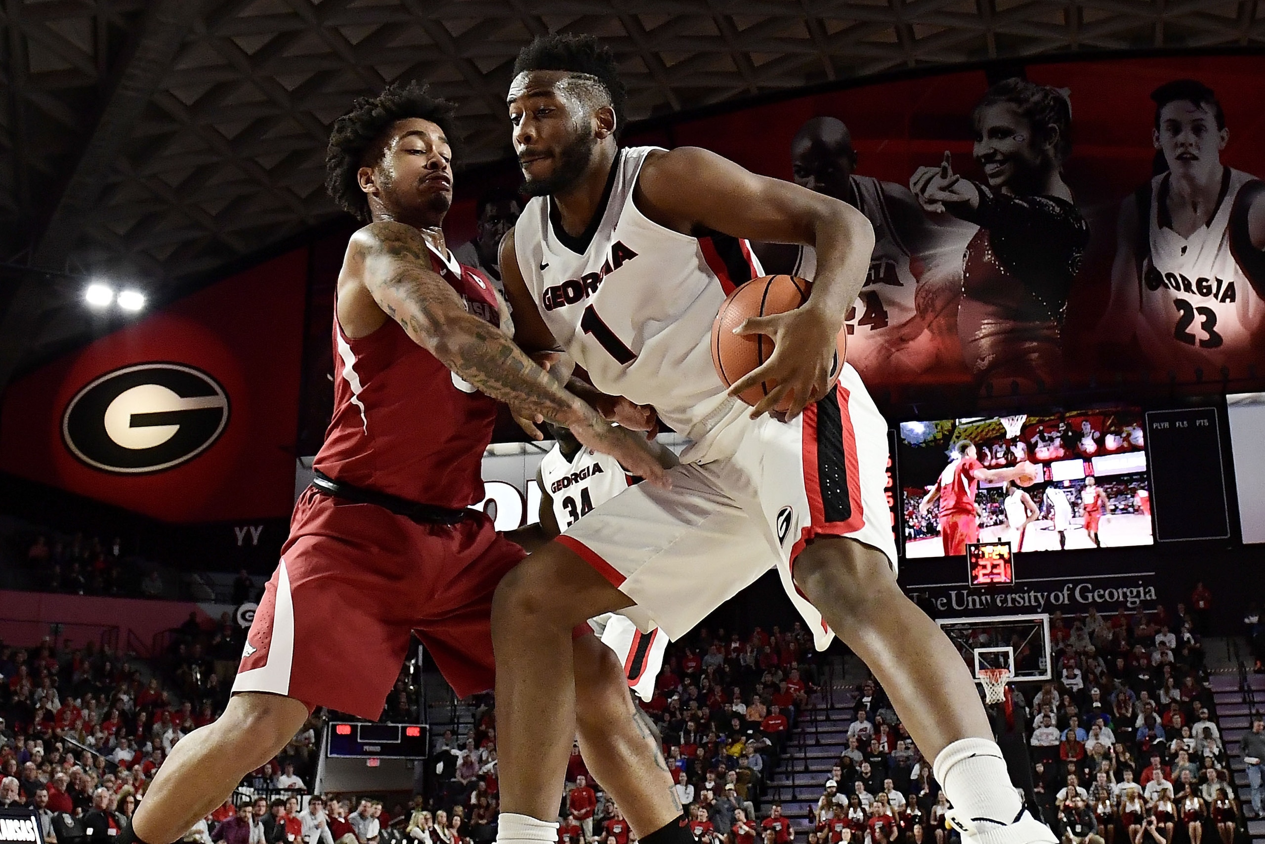 ATHENS, GA - JANUARY 23:  Anton Beard #31 of the Arkansas Razorbacks defends Yante Maten #1 of the Georgia Bulldogs during the baskteball game at Stegeman Coliseum on January 23, 2018 in Athens, Georgia.  (Photo by Mike Comer/Getty Images)