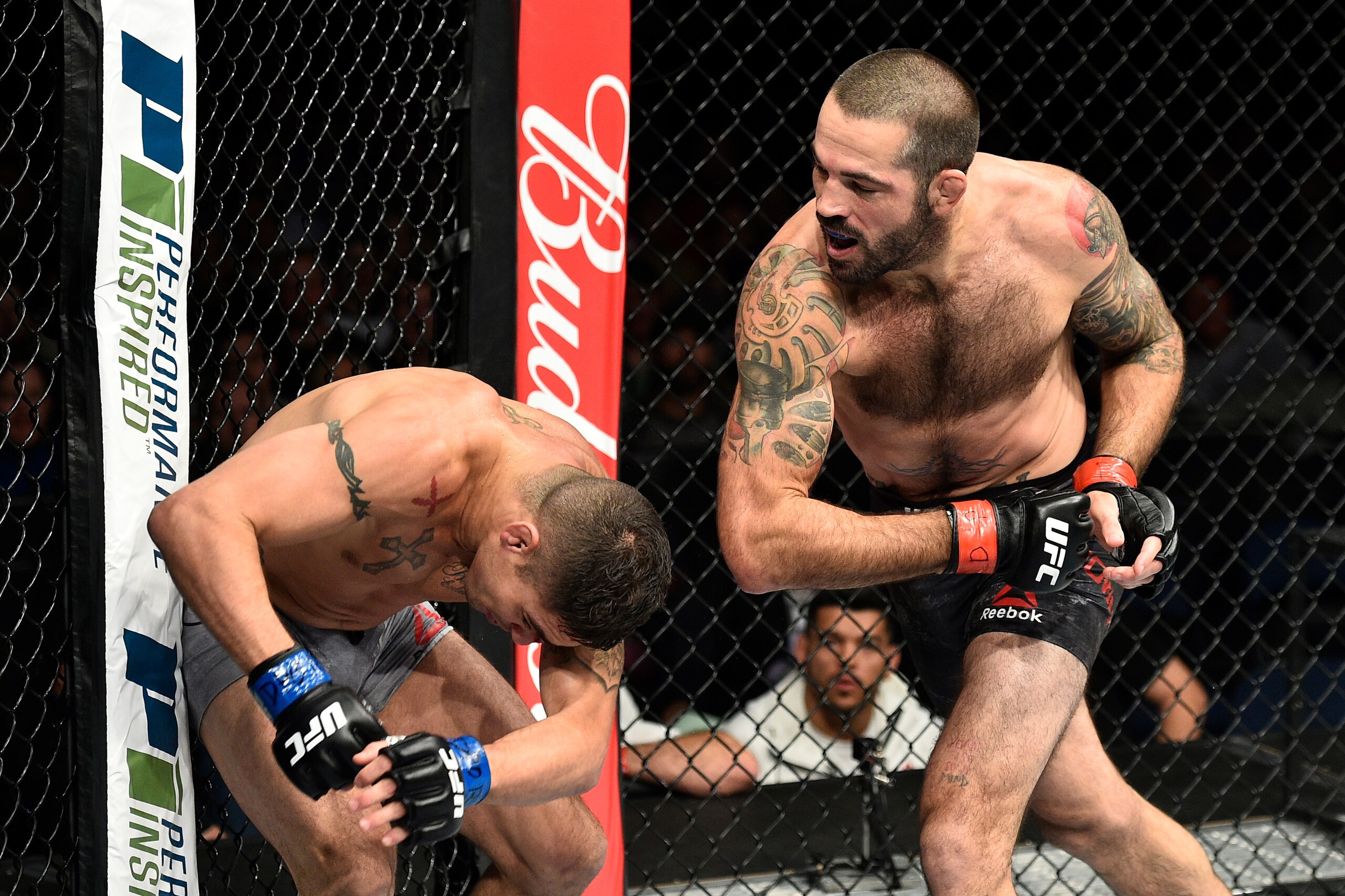 NORFOLK, VA - NOVEMBER 11:  (R-L) Matt Brown throws an elbow against Diego Sanchez in their welterweight bout during the UFC Fight Night event inside the Ted Constant Convention Center on November 11, 2017 in Norfolk, Virginia. (Photo by Brandon Magnus/Zu