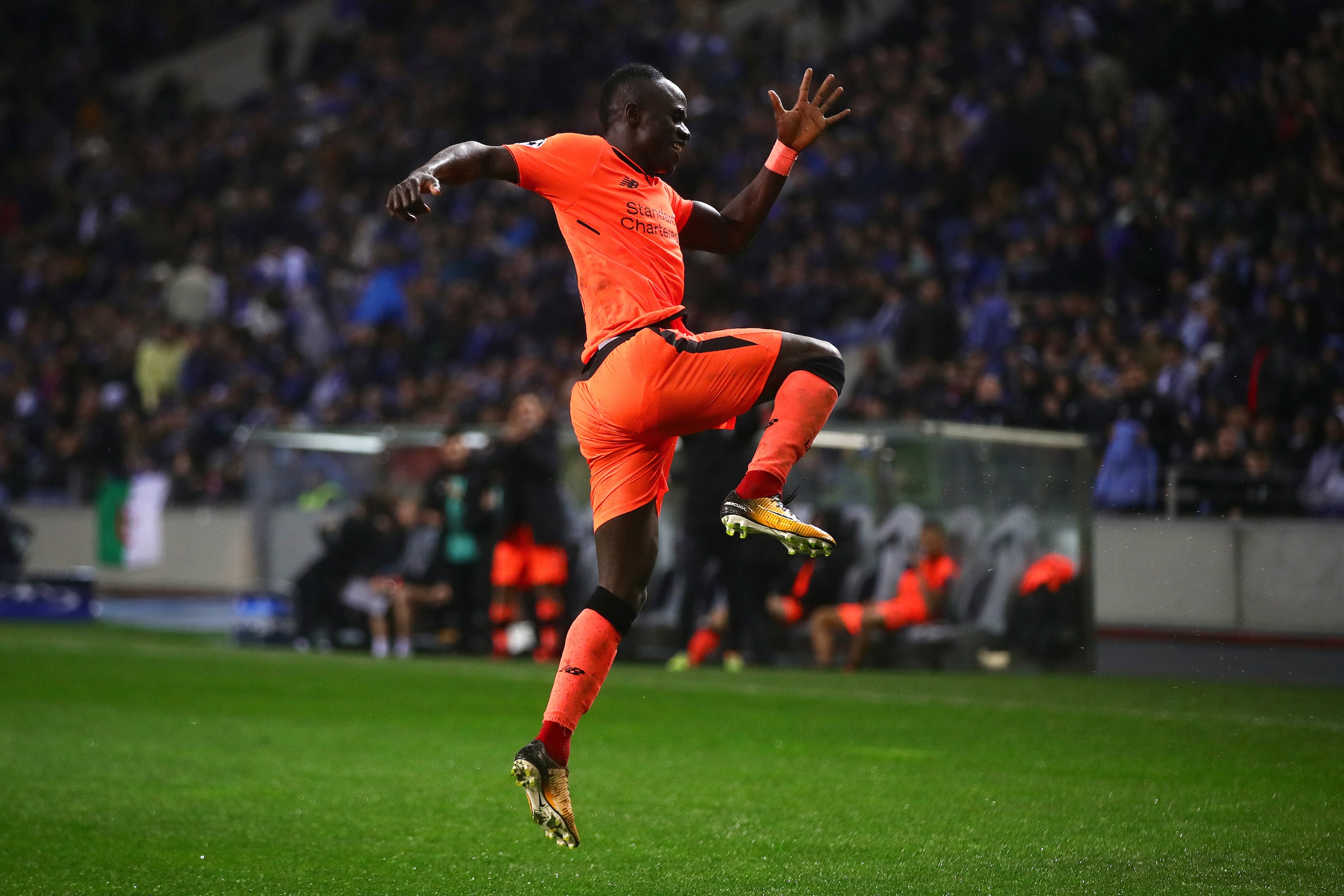 PORTO, PORTO - FEBRUARY 14: Sadio Mane of Liverpool celebrates scoring his side's fifth goal during the UEFA Champions League Round of 16 First Leg match between FC Porto and Liverpool at Estadio do Dragao on February 14, 2018 in Porto, Portugal. (Phot PORTO, PORTO - FEBRUARY 14: Sadio Mane of Liverpool celebrates scoring his side's fifth goal during the UEFA Champions League Round of 16 First Leg match between FC Porto and Liverpool at Estadio do Dragao on February 14, 2018 in Porto, Portugal. (Phot