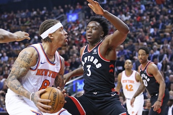 TORONTO, ON - FEBRUARY 8:  Michael Beasley #8 of the New York Knicks is guarded closely by OG Anunoby #3 of the Toronto Raptors in an NBA game at the Air Canada Centre on February 8, 2018 in Toronto, Ontario, Canada. The Raptors defeated the Knicks 113-88