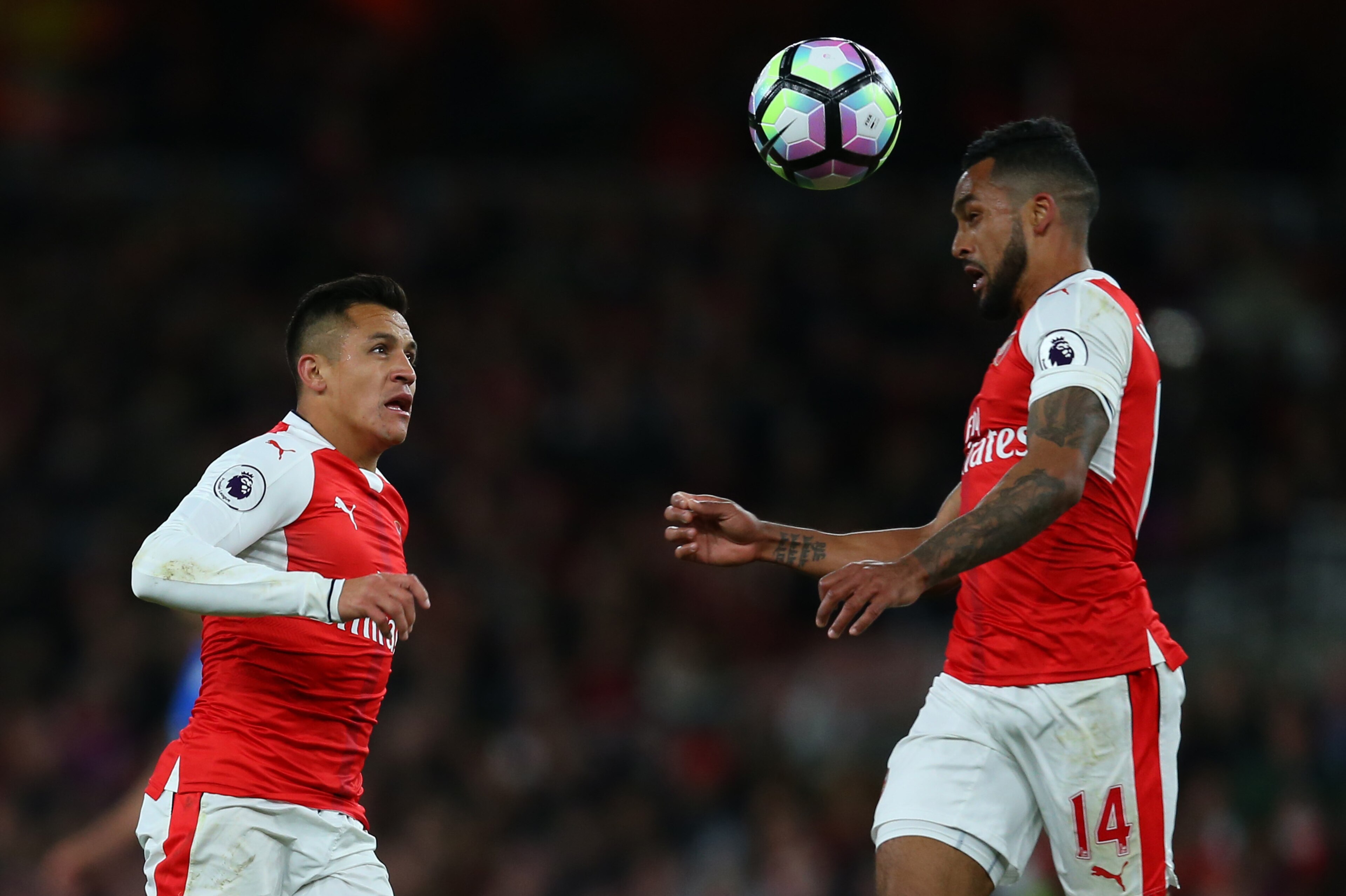 LONDON, ENGLAND - APRIL 26: Alexis Sanchez of Arsenal and Theo Walcott of Arsenal during the Premier League match between Arsenal and Leicester City at Emirates Stadium on April 26, 2017 in London, England. (Photo by Catherine Ivill - AMA/Getty Images) LONDON, ENGLAND - APRIL 26: Alexis Sanchez of Arsenal and Theo Walcott of Arsenal during the Premier League match between Arsenal and Leicester City at Emirates Stadium on April 26, 2017 in London, England. (Photo by Catherine Ivill - AMA/Getty Images)