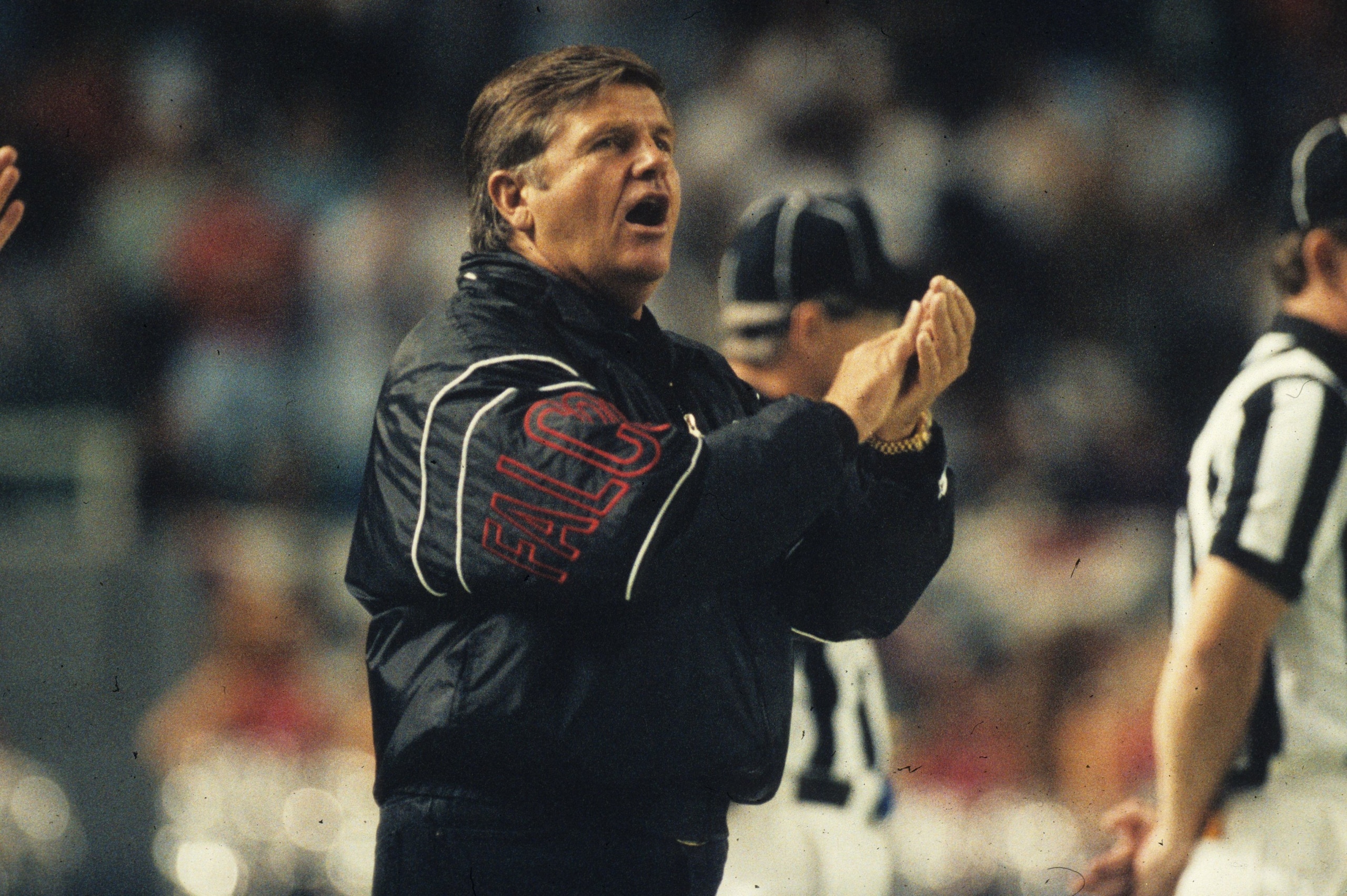ATLANTA, GA - SEPTEMBER 6:  Head coach Jerry Glanville of the  Atlanta Falcons encourages his players from the sideline against the New York Jets in the Georgia Dome on September 6, 1992 in Atlanta, Georgia. The Falcons defeated the Jets 20-17. (Photo by 