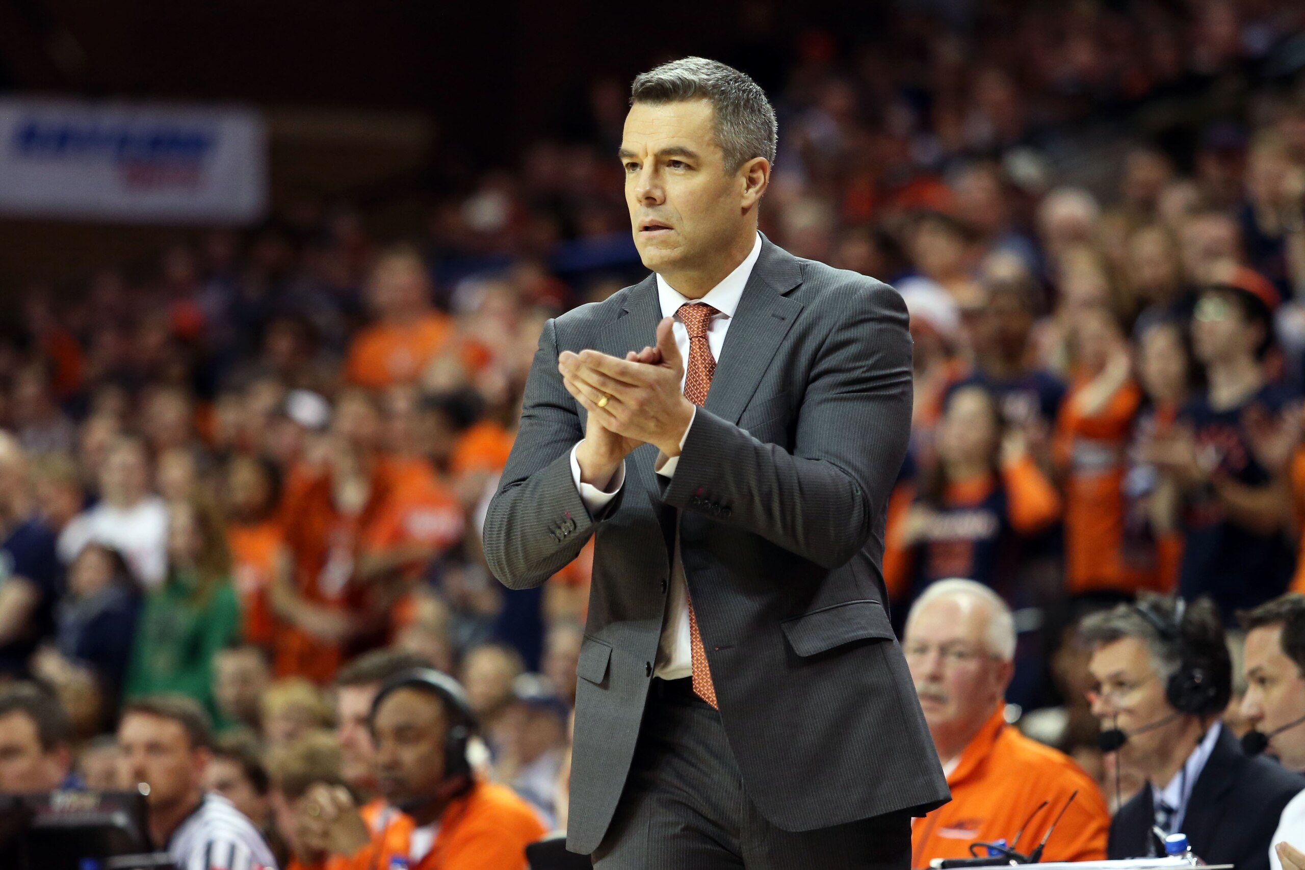 CHARLOTTESVILLE, VA - MARCH 3: Head coach Tony Bennett of the Virginia Cavaliers claps in the second half during a game against the Notre Dame Fighting Irish at John Paul Jones Arena on March 3, 2018 in Charlottesville, Virginia. Virginia defeated Notre D