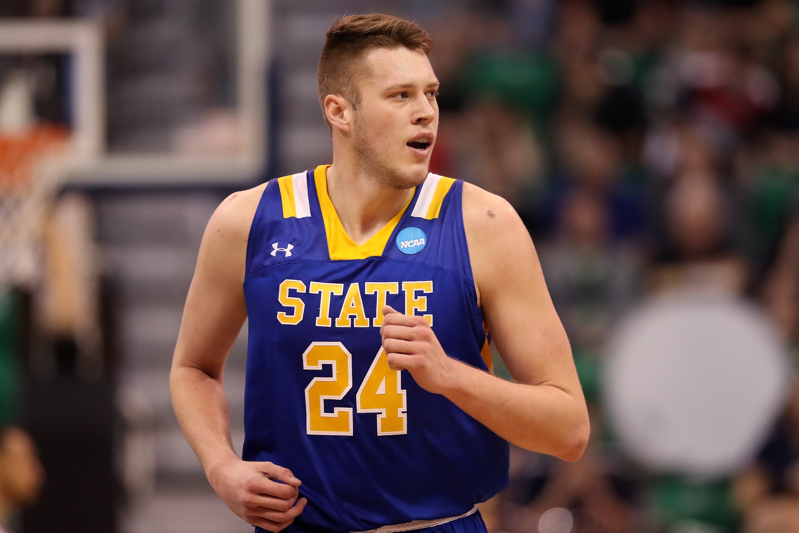 SALT LAKE CITY, UT - MARCH 16: Mike Daum #24 of the South Dakota State Jackrabbits runs up court in the first half against the Gonzaga Bulldogs during the first round of the 2017 NCAA Men's Basketball Tournament at Vivint Smart Home Arena on March 16, 201