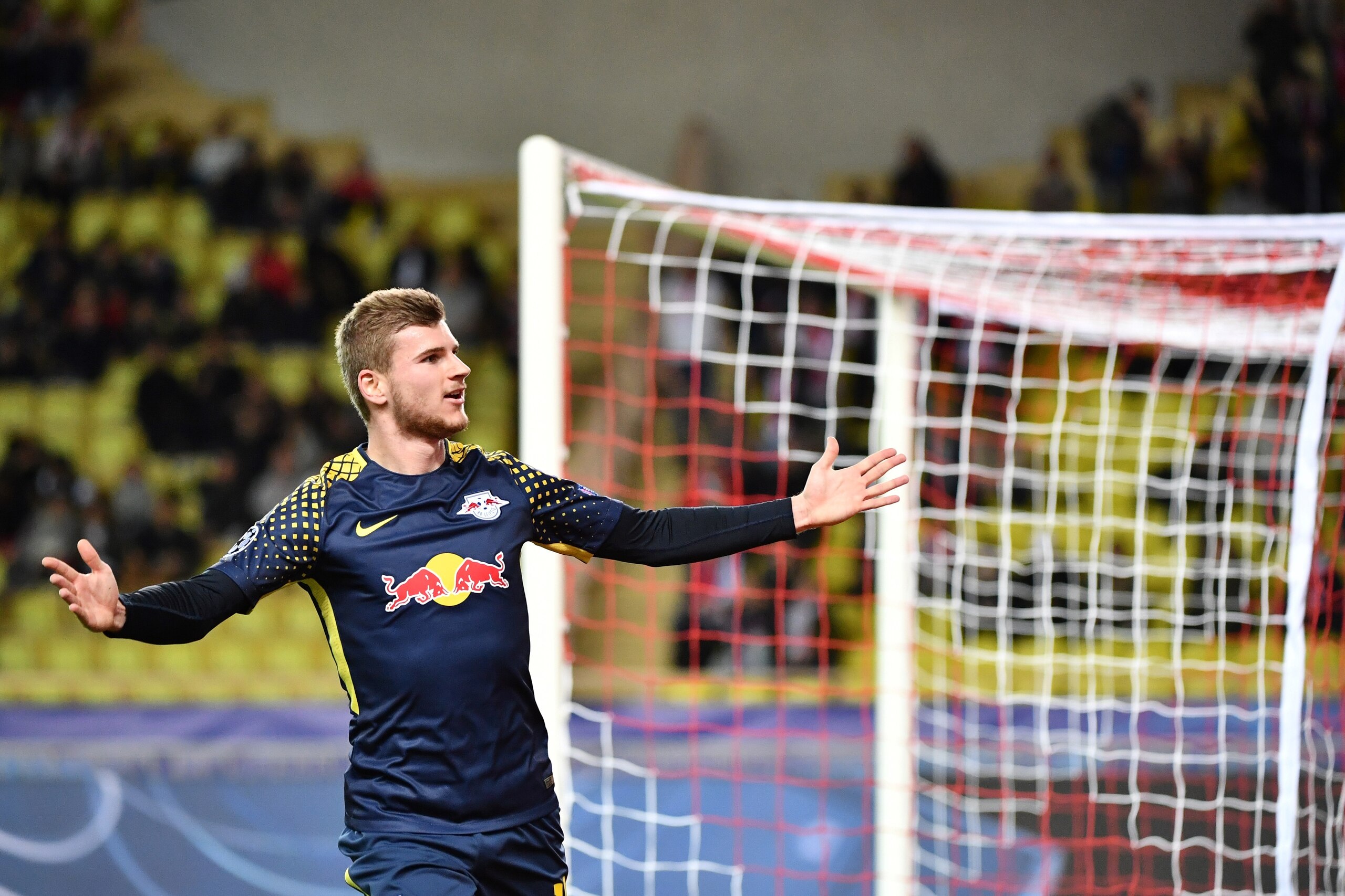 Leipzig's German forward Timo Werner celebrates after scoring a goal  during the UEFA Champions League group G football match between Monaco and Leipzig at the Louis II stadium, in Monaco, on November 21, 2017. / AFP PHOTO / Bertrand LANGLOIS        (Phot