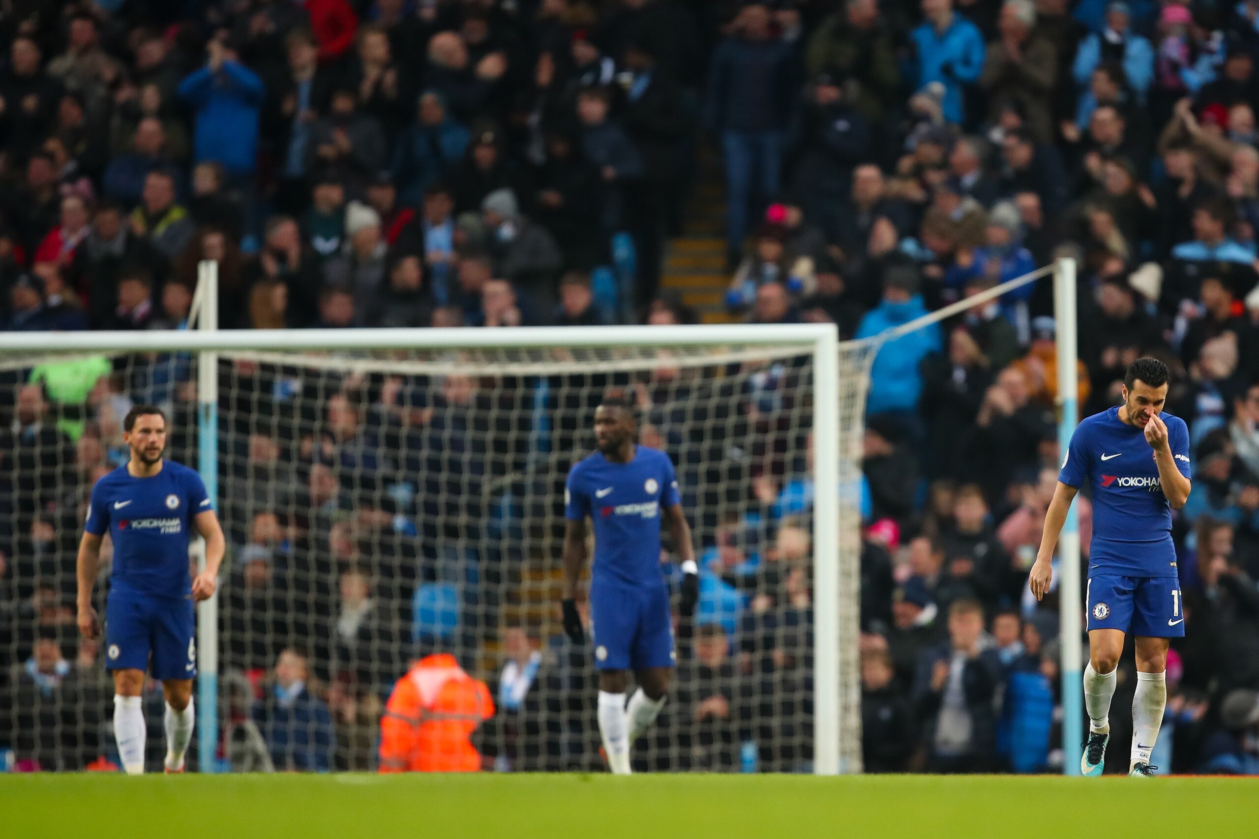 MANCHESTER, ENGLAND - MARCH 04: Dejected Chelsea players after conceding to make it 1-0 during the Premier League match between Manchester City and Chelsea at Etihad Stadium on March 4, 2018 in Manchester, England. (Photo by Robbie Jay Barratt - AMA/Getty