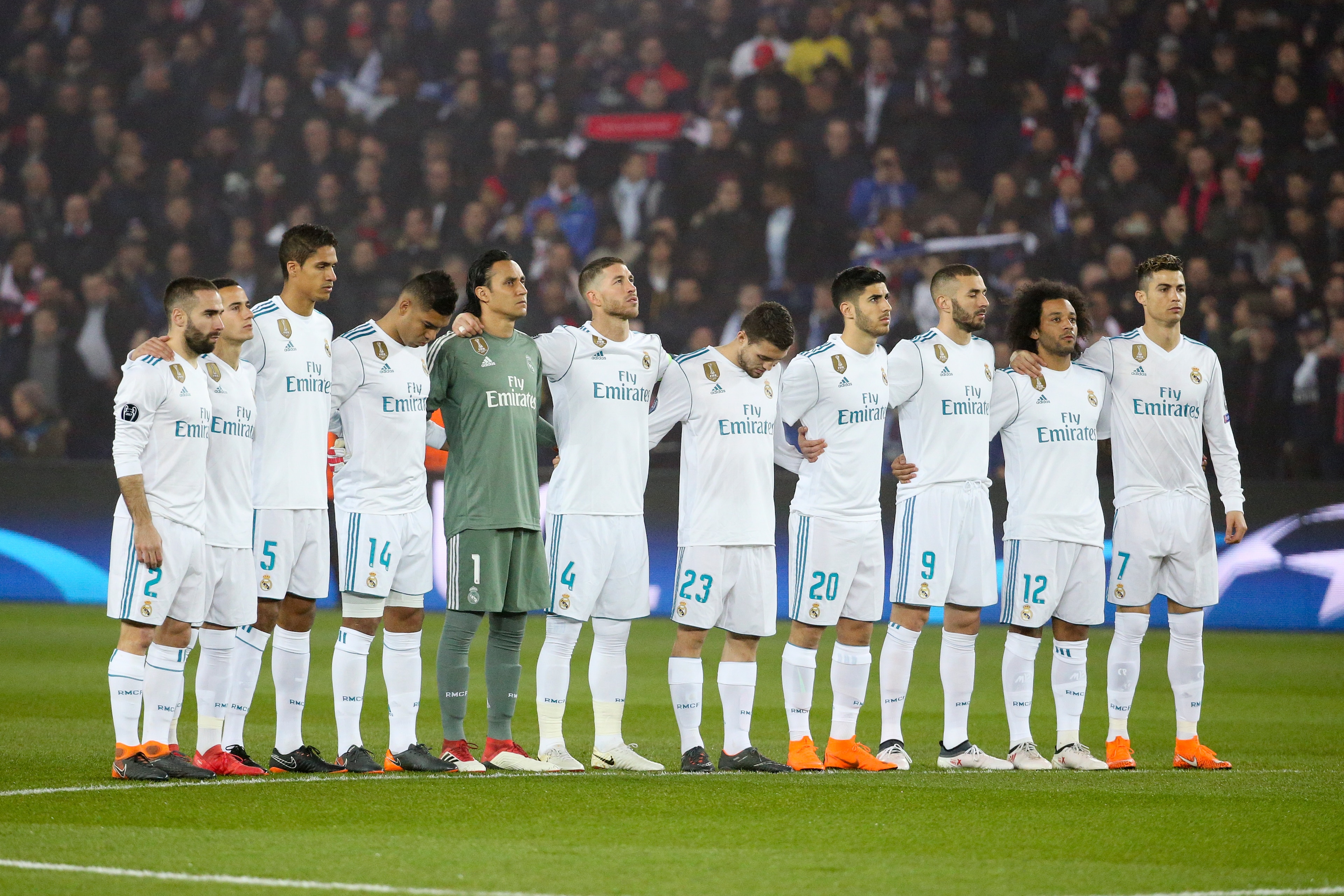 PARIS, FRANCE - MARCH 6: Players of Real Madrid during the minute of silence in tribute to Davide Astori of Fiorentina who passed away last week end prior to the UEFA Champions League Round of 16 Second Leg match between Paris Saint-Germain (PSG) and Real