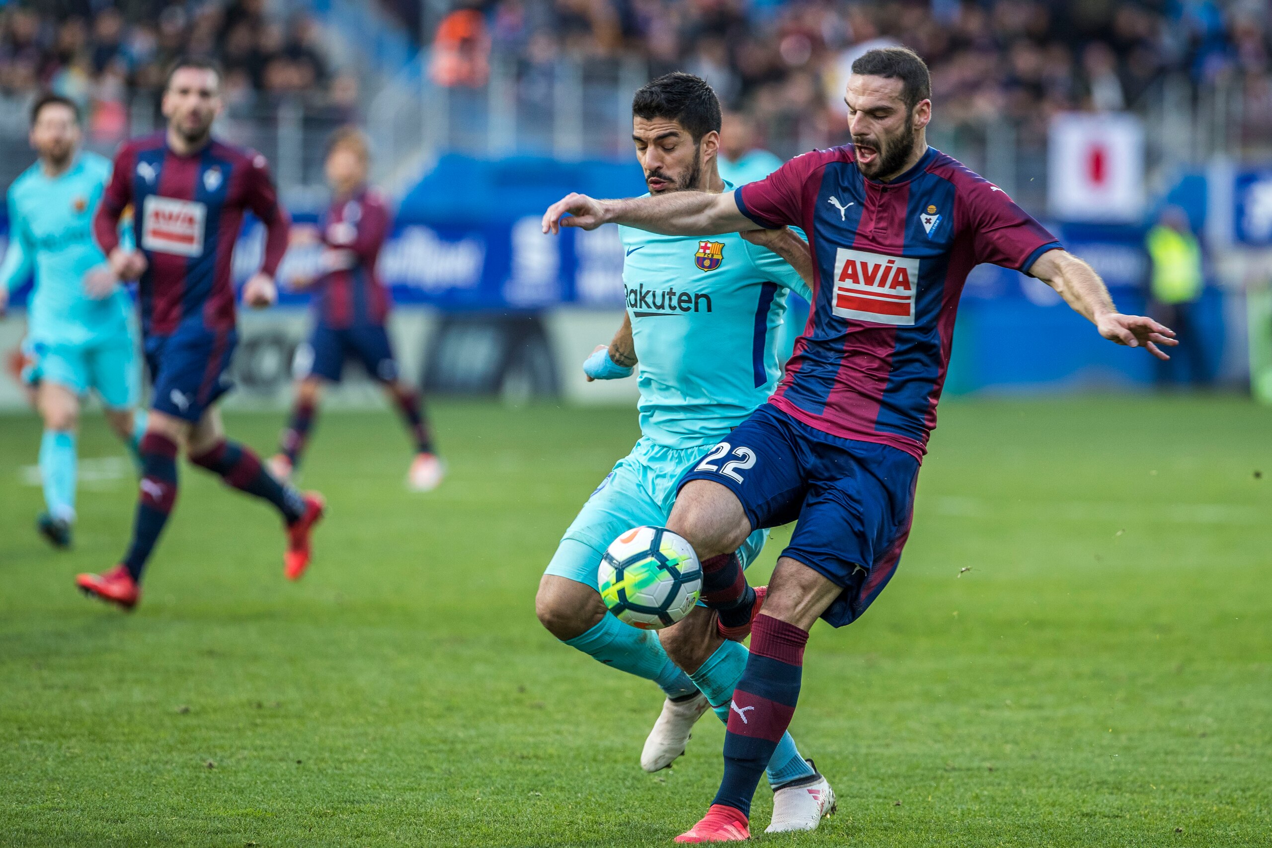 EIBAR, SPAIN - FEBRUARY 17: (L-R) Luis Suarez of FC Barcelona, David Lomban of SD Eibar  during the La Liga Santander  match between Eibar v FC Barcelona at the Estadio Municipal de Ipurua on February 17, 2018 in Eibar Spain (Photo by David S. Bustamante/