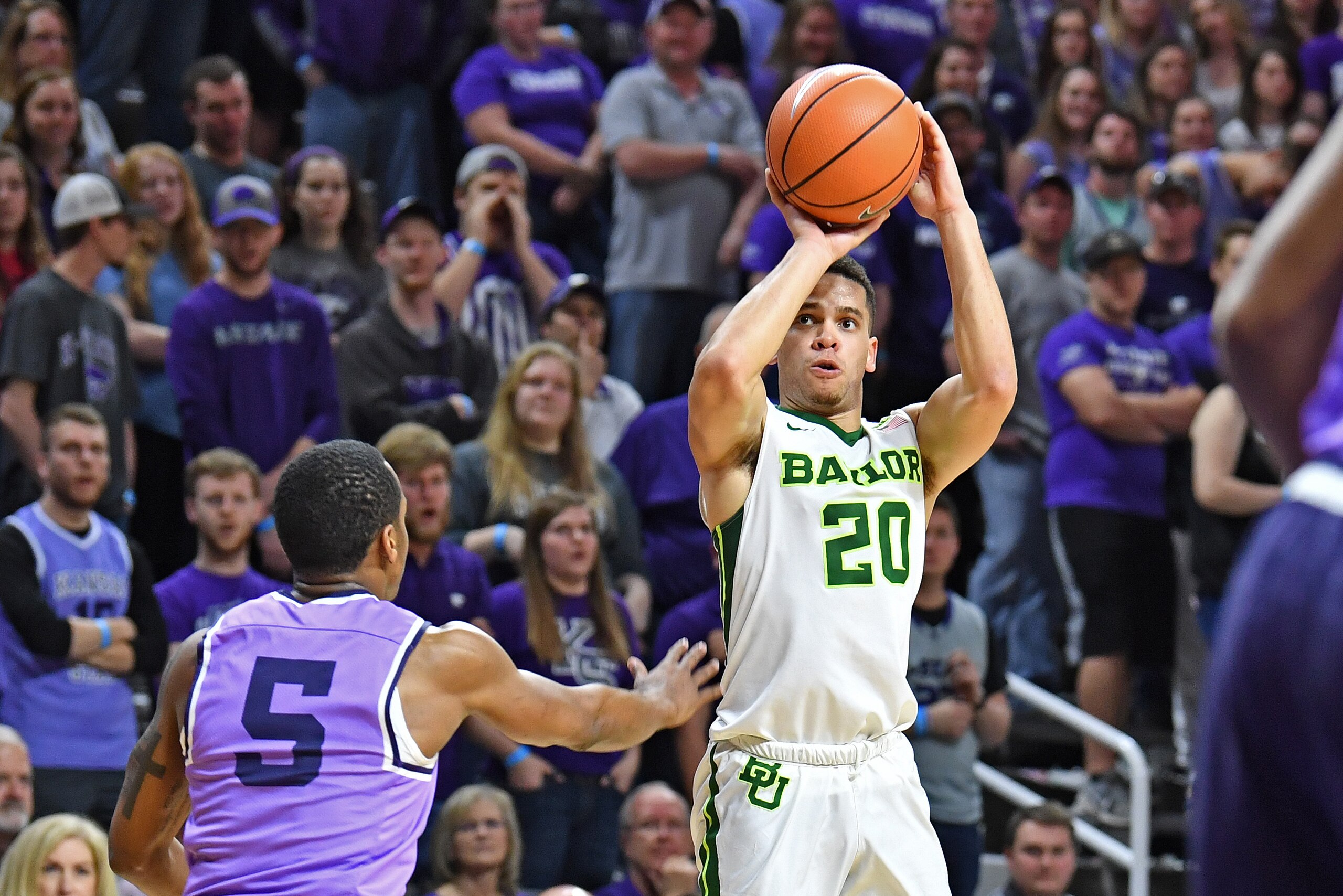 MANHATTAN, KS - MARCH 03:  Manu Lecomte #20 of the Baylor Bears puts up a shot against Barry Brown #5 of the Kansas State Wildcats during the first half on March 3, 2018 at Bramlage Coliseum in Manhattan, Kansas.  (Photo by Peter G. Aiken/Getty Images)