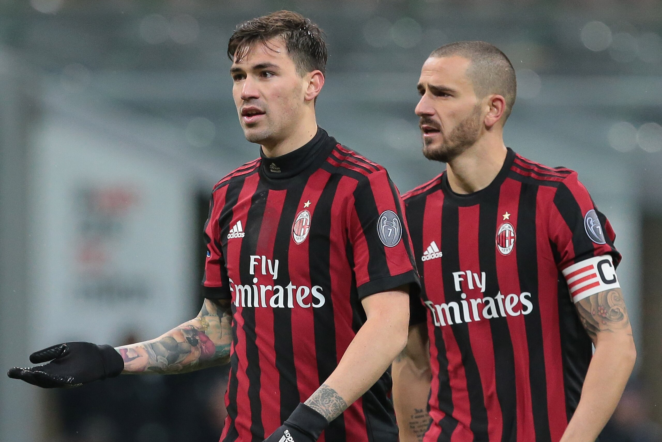 MILAN, ITALY - FEBRUARY 18:  Alessio Romagnoli (L) and Leonardo Bonucci of AC Milan look on during the serie A match between AC Milan and UC Sampdoria at Stadio Giuseppe Meazza on February 18, 2018 in Milan, Italy.  (Photo by Emilio Andreoli/Getty Images)