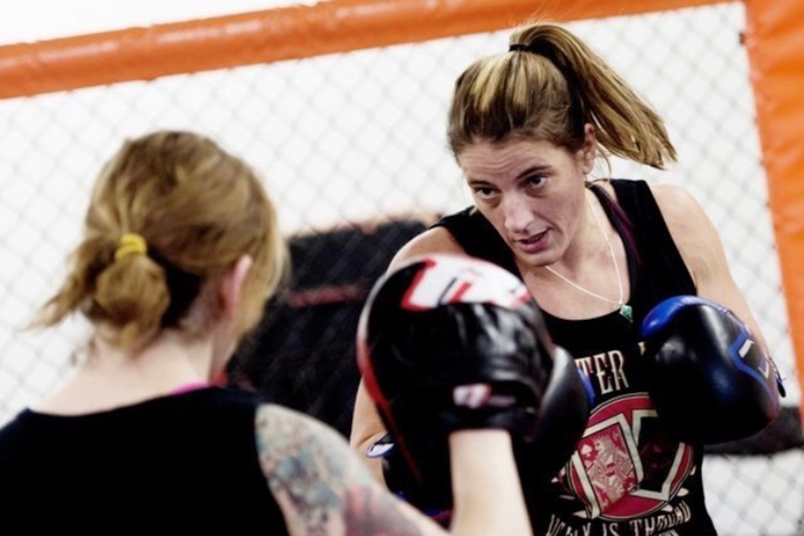 Olivia Parker trains with teammate Shamir Peshewa Jackson.