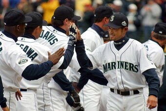 SEATTLE, UNITED STATES:  Seattle Mariners Ichiro Suzuki (R) is introduced during pre-game ceremonies before the Mariners game against the Chicago White Sox, in Seattle, 01 April 2002. Ichiro was selected the 2001 American League MVP and Rookie of the Year