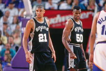 PHOENIX, AZ - 1998: Tim Duncan #21 of the San Antonio Spurs  looks on against the Phoenix Suns during Game 1 of the First Round of the Western Conference Playoffs on April 23, 1998 at America West Arena in Phoenix, Arizona. NOTE TO USER: User expressly ac