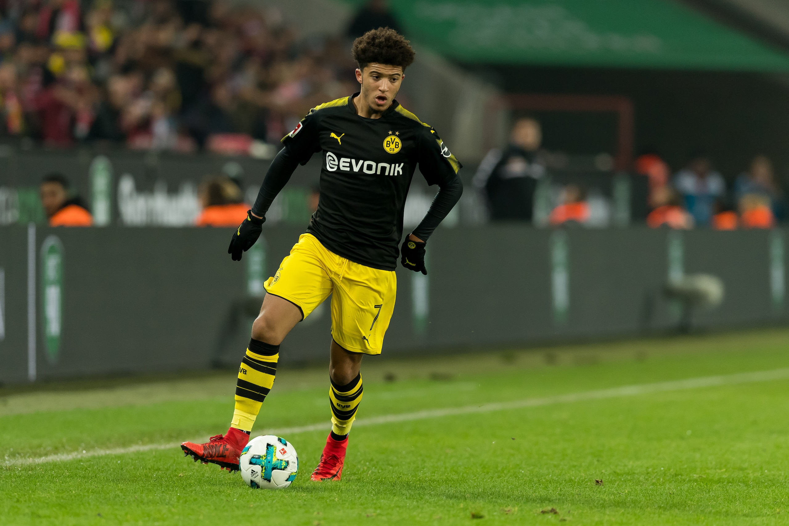 COLOGNE, GERMANY - FEBRUARY 02: Jadon Sancho of Dortmund controls the ball during the Bundesliga match between 1. FC Koeln and Borussia Dortmund at RheinEnergieStadion on February 2, 2018 in Cologne, Germany. (Photo by TF-Images/TF-Images via Getty Images