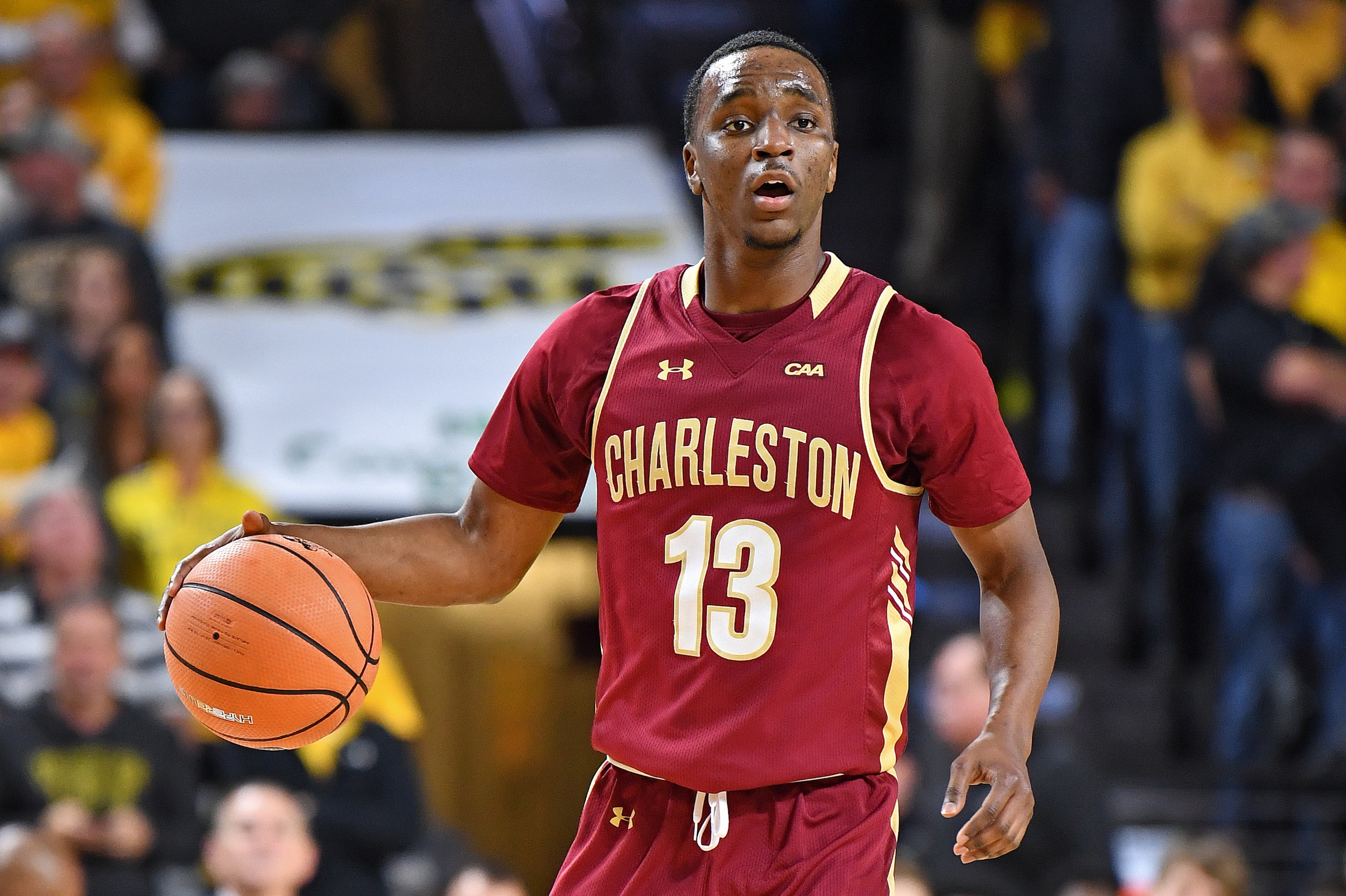 WICHITA, KS - NOVEMBER 13:  Guard Joe Chealey #13 of the College of Charleston Cougars dribbles the ball up court against the Wichita State Shockers during the second half on November 13, 2017 at Charles Koch Arena in Wichita, Kansas.  (Photo by Peter G. 