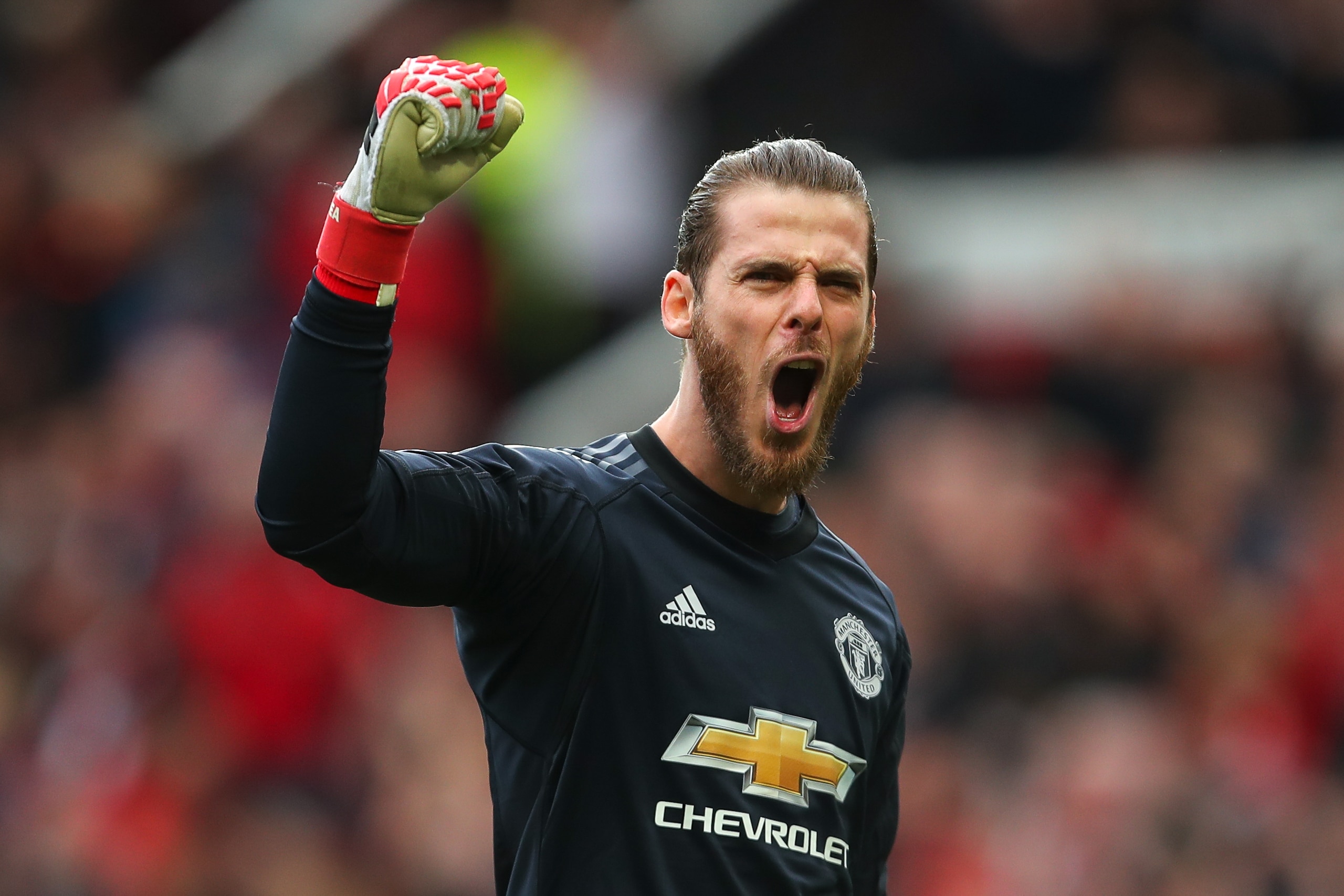 MANCHESTER, ENGLAND - MARCH 10: David De Gea of Manchester United celebrates during the Premier League match between Manchester United and Liverpool at Old Trafford on March 10, 2018 in Manchester, England. (Photo by Robbie Jay Barratt - AMA/Getty Images) MANCHESTER, ENGLAND - MARCH 10: David De Gea of Manchester United celebrates during the Premier League match between Manchester United and Liverpool at Old Trafford on March 10, 2018 in Manchester, England. (Photo by Robbie Jay Barratt - AMA/Getty Images)
